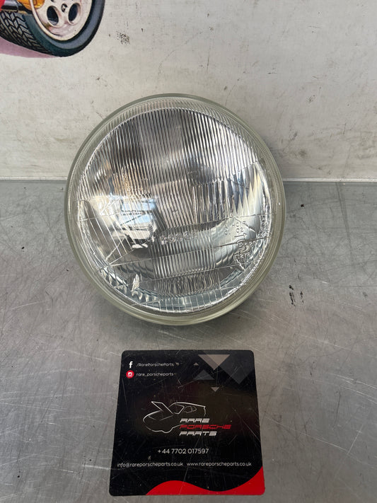 Porsche 968 Left side Bosch headlight, used 94463192900 / 0301900309 / 1305304021