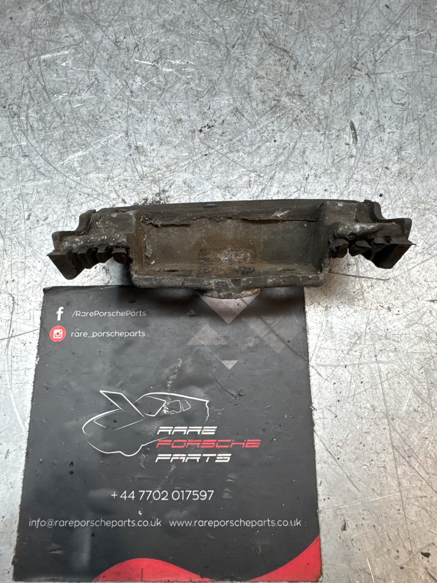 Porsche 924/944 right tailgate / Hatch pin housing 477827034 used