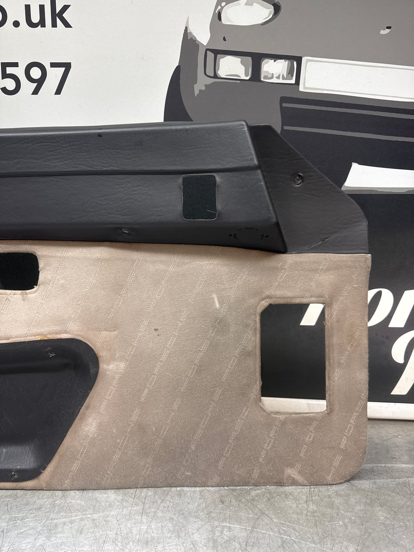 Porsche 924 / Early 944 Black Porsche script door cards. Right Hand Drive, Used. 478867011. Fibreglass repaired