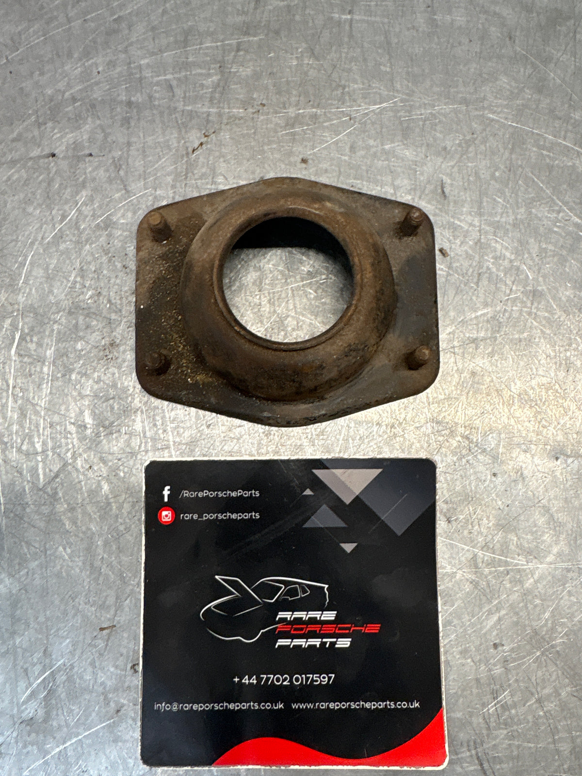 Porsche 924 / 944 front suspension bearing flange, 477412345, used