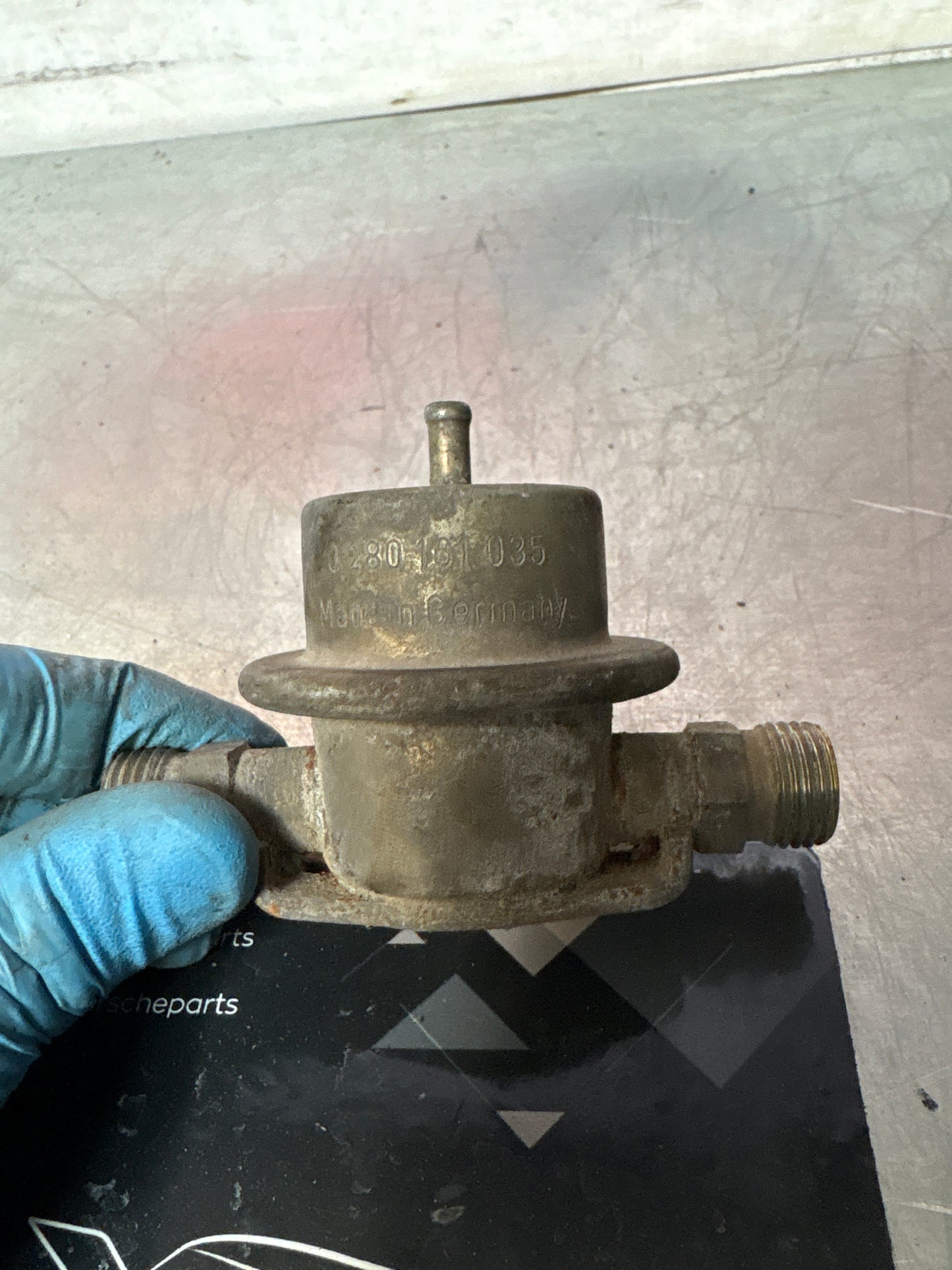 Porsche 928 S4 fuel pressure damper, used. 0280161035