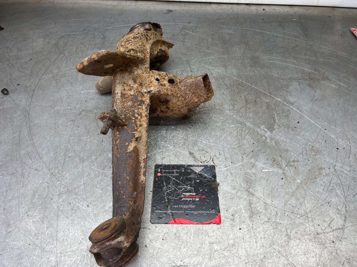 Porsche 924 944  -85.5 Rear left trailing arm, 94433102100