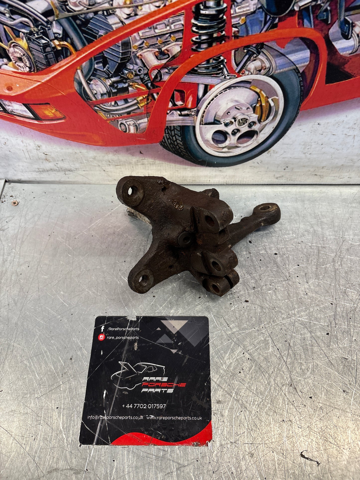 Porsche 924 76-78 Front left Spindle, knuckle, 477407311G, used