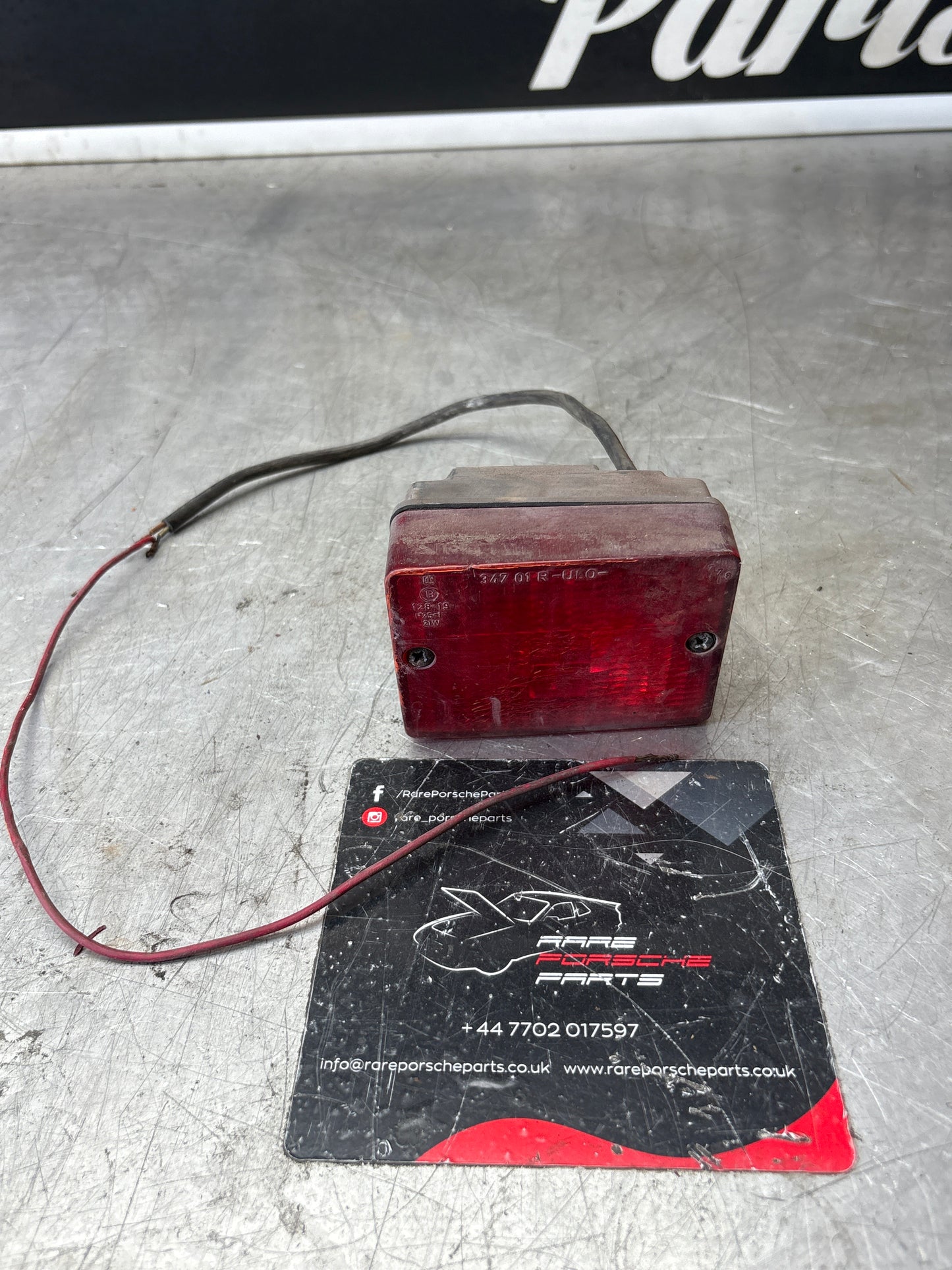 Porsche 928 left rear fogliht, used 92863142801R / 92863142701L spares or repair