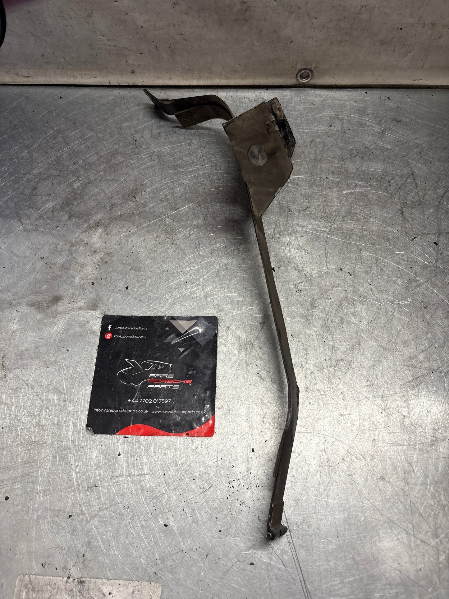 Porsche 944 S2 / Turbo 90- left fuel tank restraining strap, used 95120131502