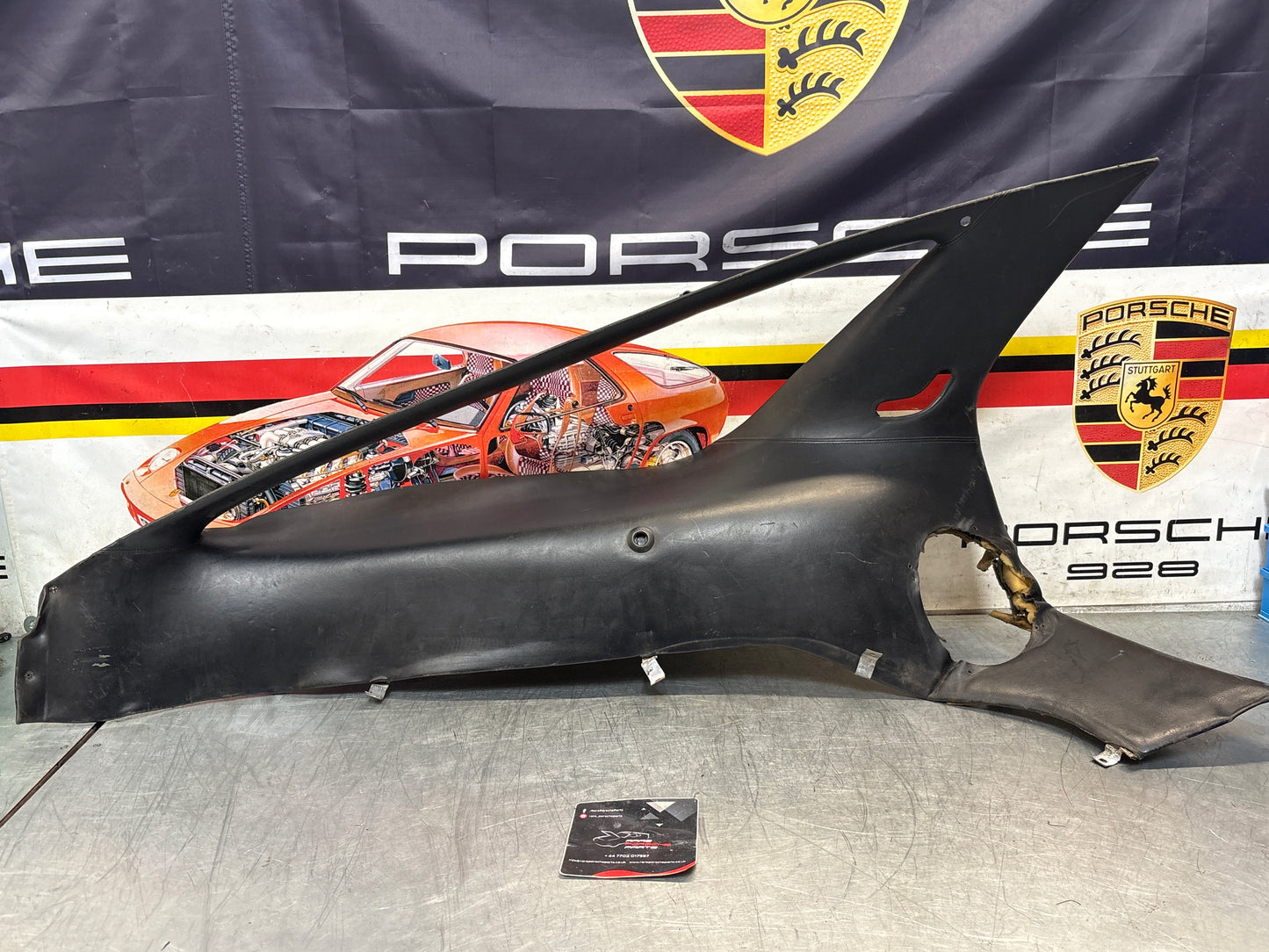 Porsche 928 early left side lower side trim panel, without loudspeaker, black used 92855502102