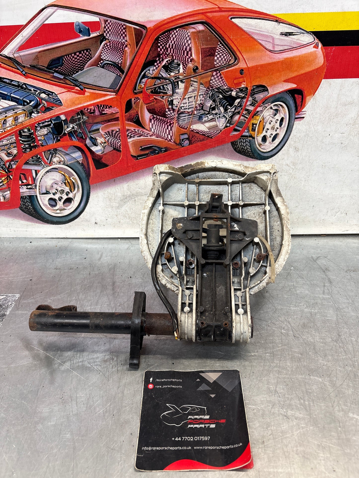 Porsche 928 left headlight swivel frame 92875024902 92875024302 used