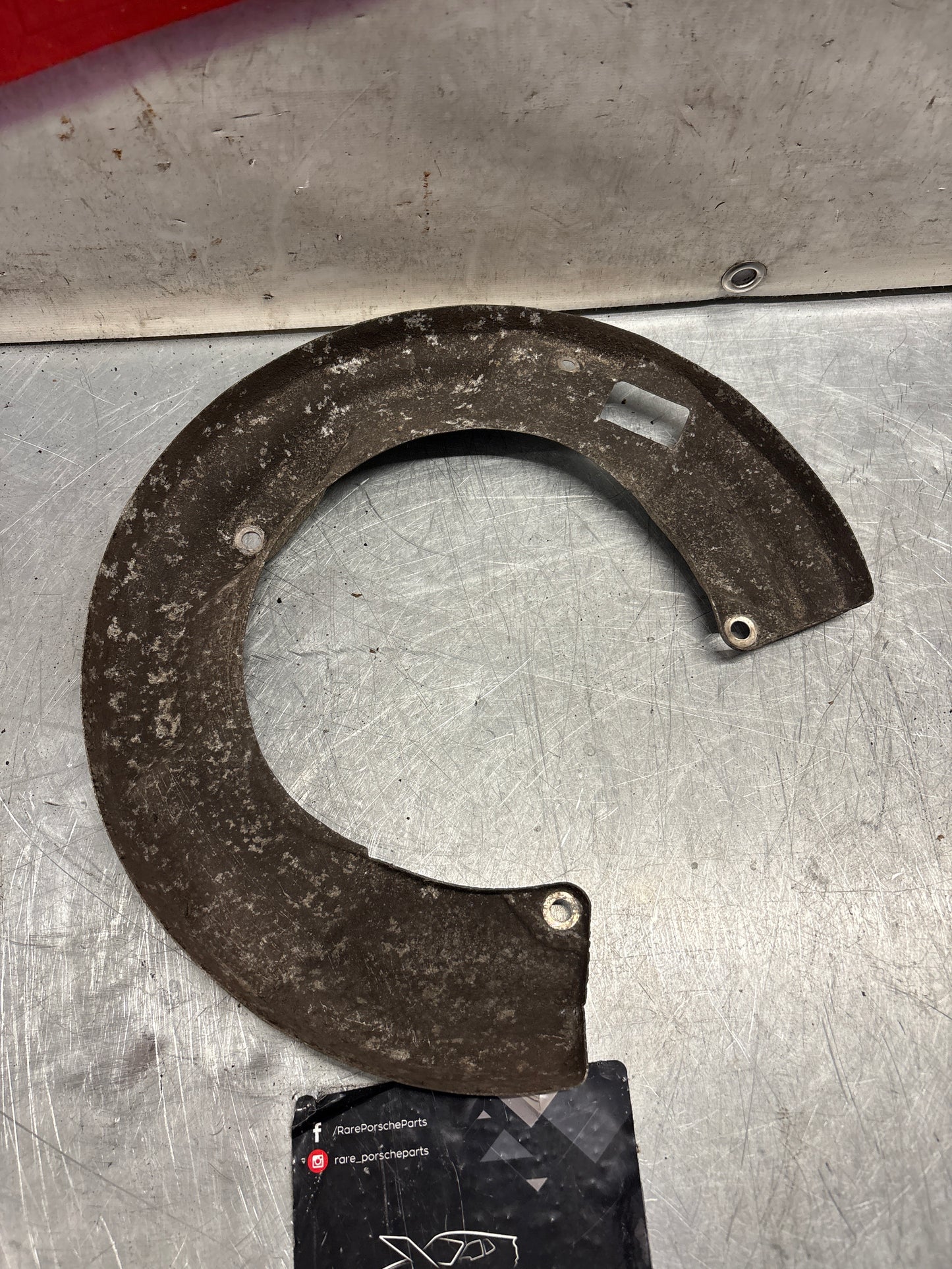 Porsche 928 S4 rear right brake dust cover plate, used 92835281405