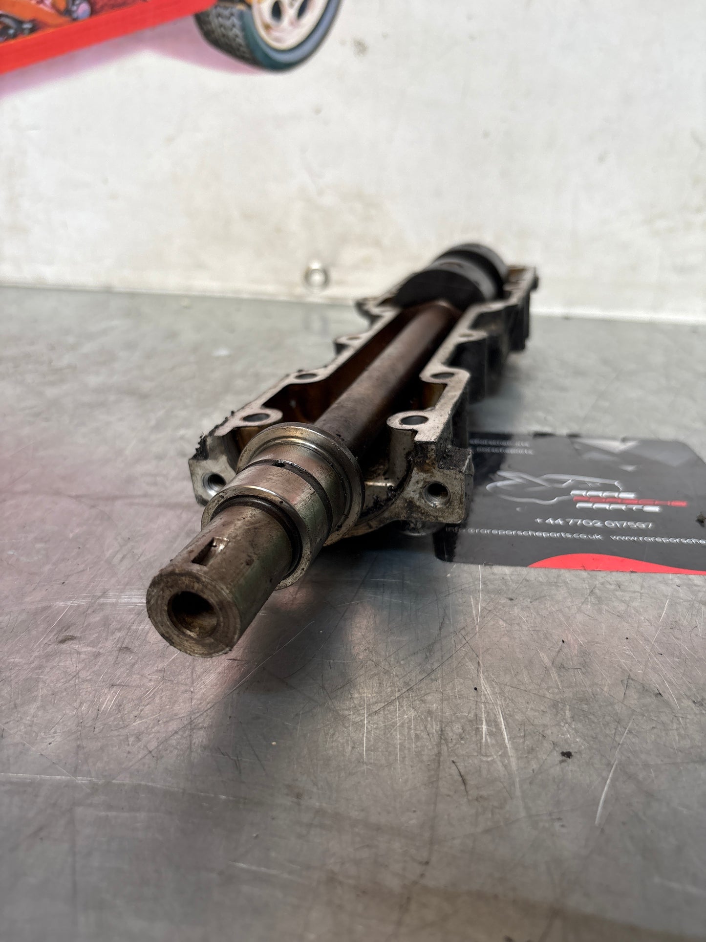Porsche 944 Balance shaft, with housing, used 9441011058R