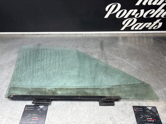 Porsche 944 Left side door glass, tinted green used 94454202301