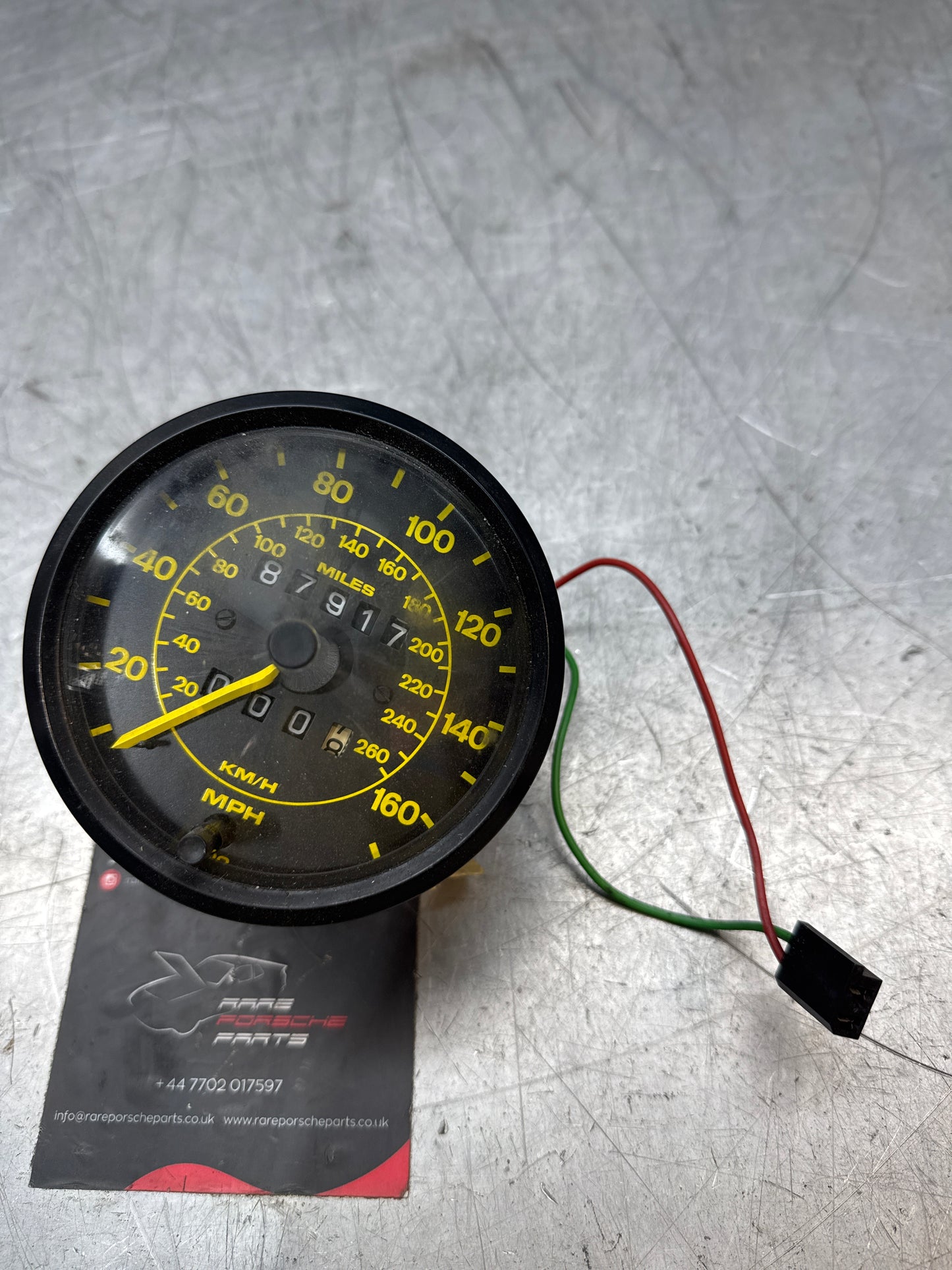 Porsche 944 speedometer showing 87917 miles 94464103600 used