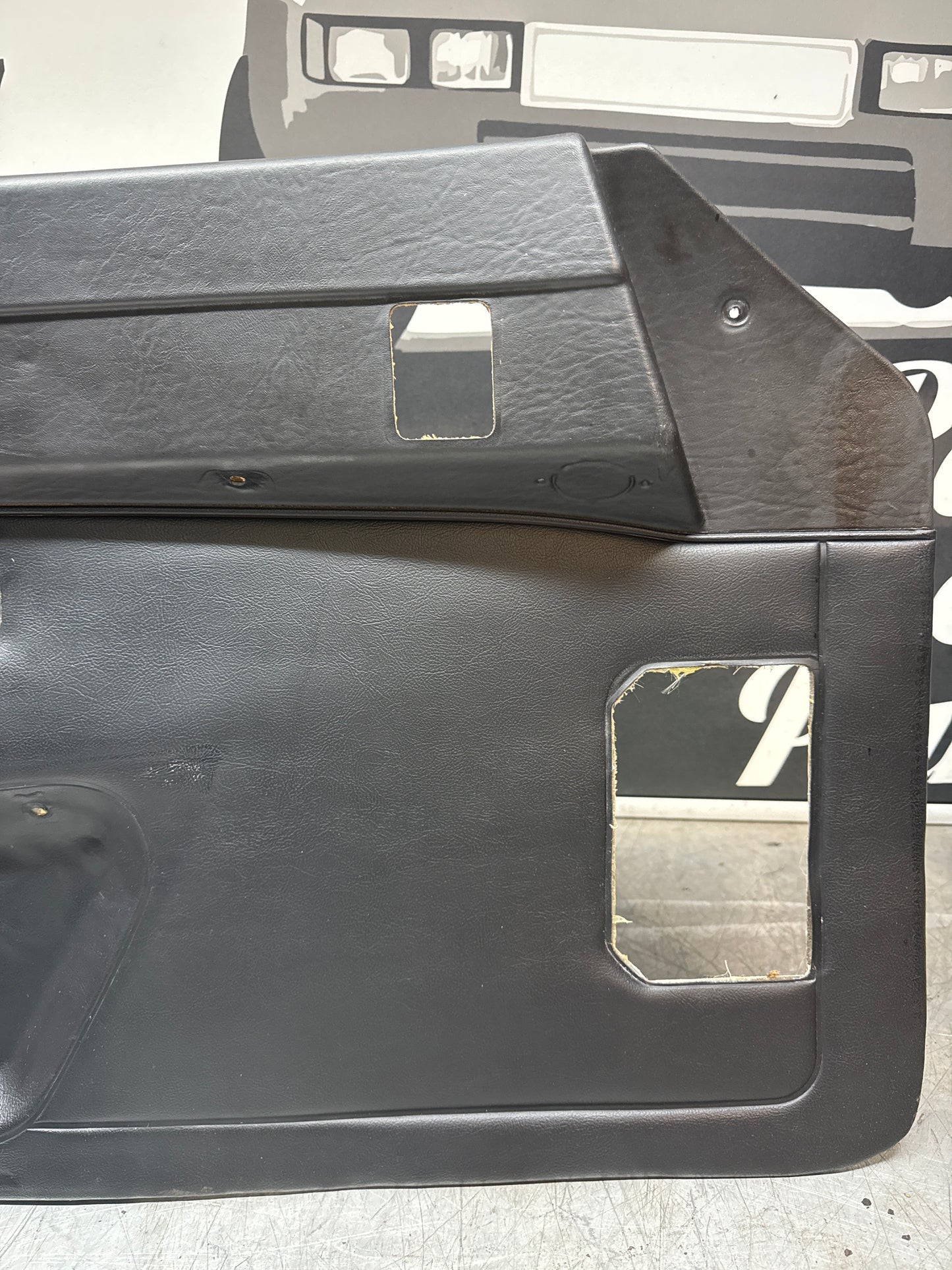 Porsche 924/ Early 944 black RHD Left door card. Fibreglass repaired. 477867012