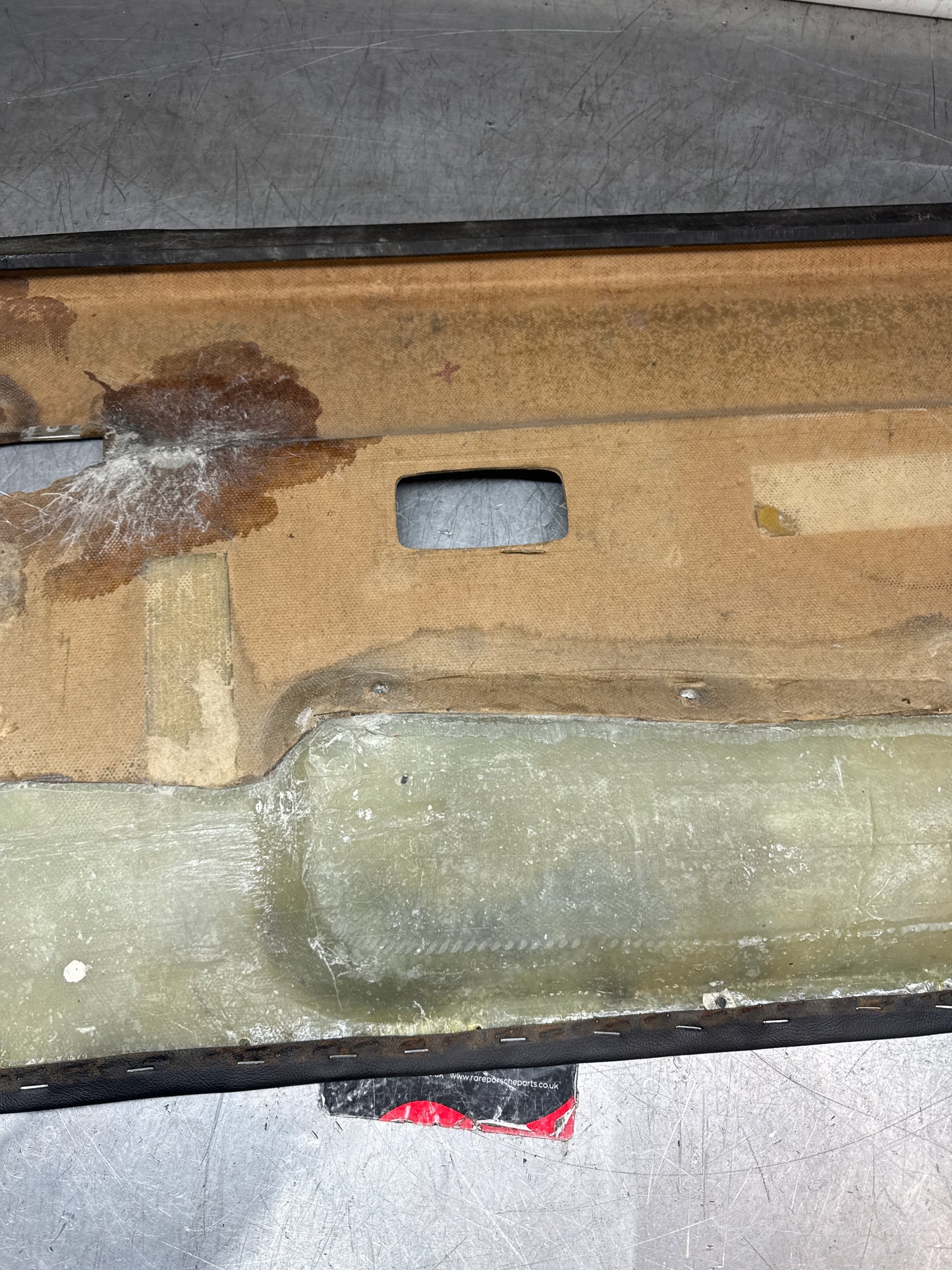 Porsche 944 left black door card for late cars from 85.5. Fibreglass repair.