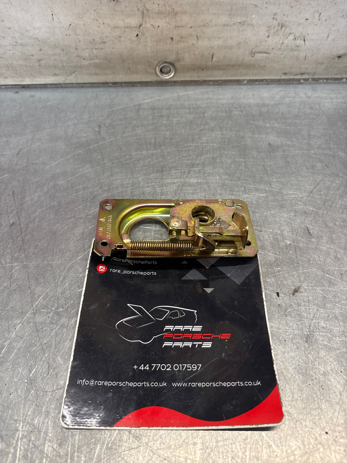 Porsche 928 lid lock lower part, refurbished 92851102702