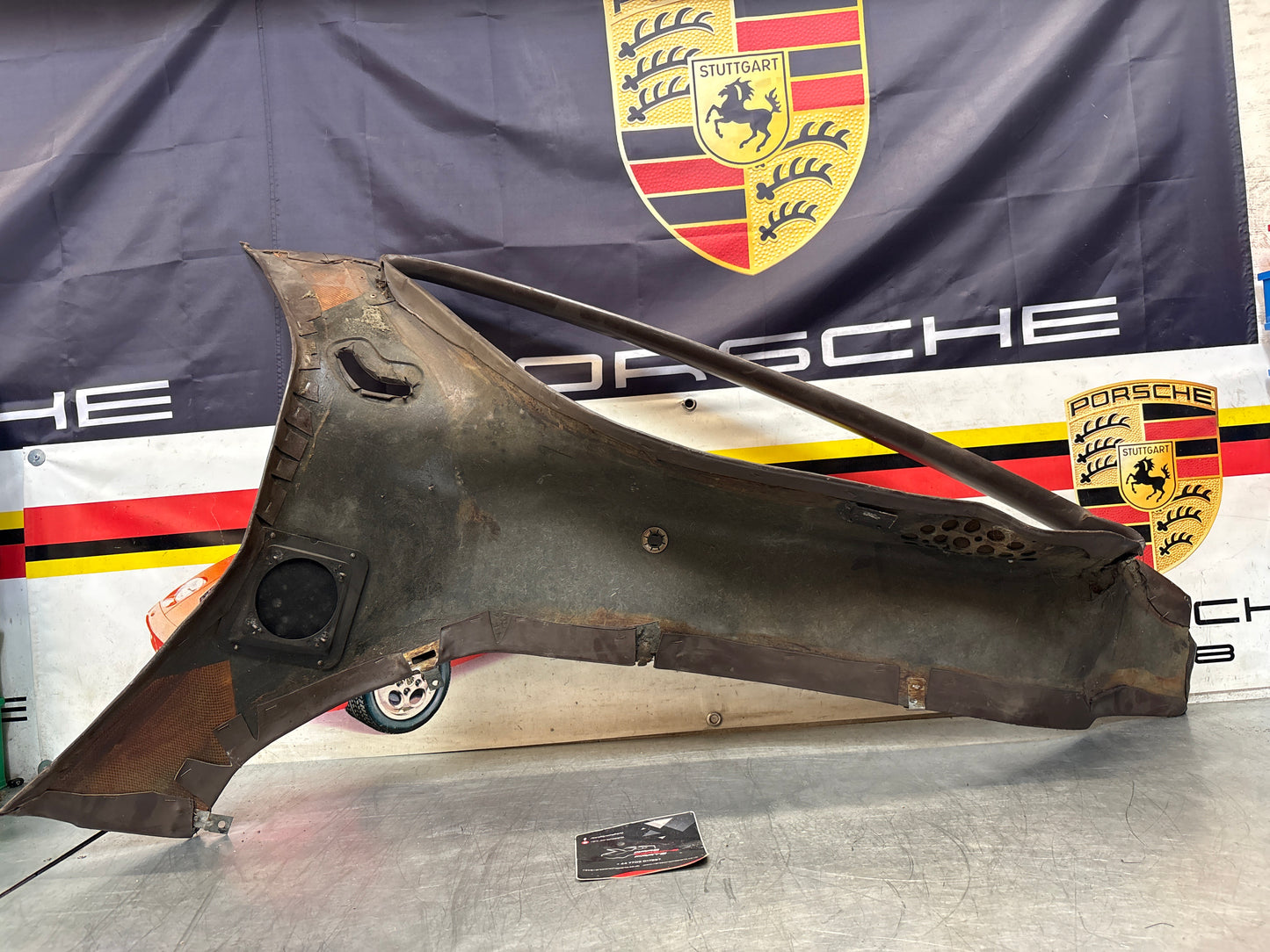 Porsche 928 early left side lower side trim panel, without loudspeaker, brown used 92855502102