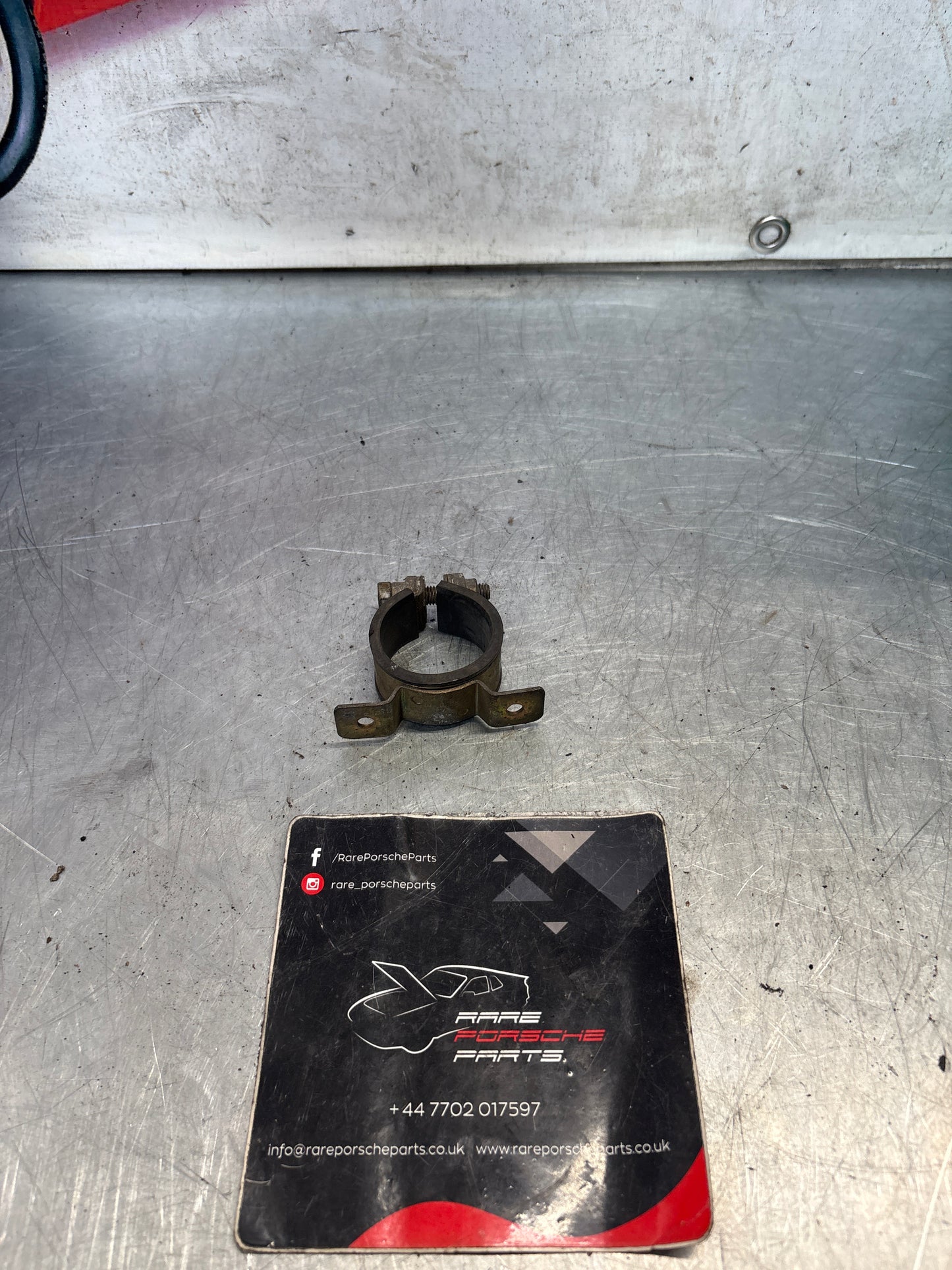 Porsche 944 Idle speed adjuster clamp, used 99951239502
