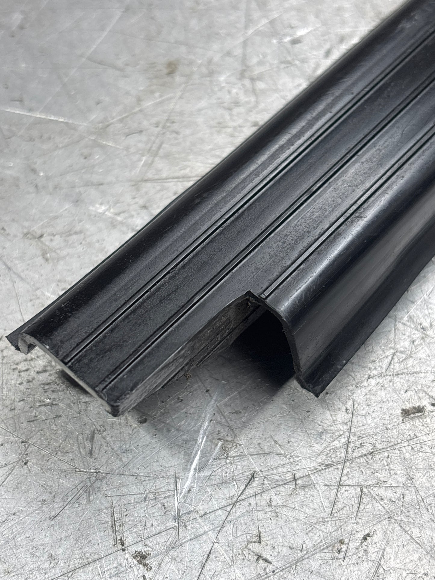 Porsche early 924/944 left sill trim, used 477853657A no cracks