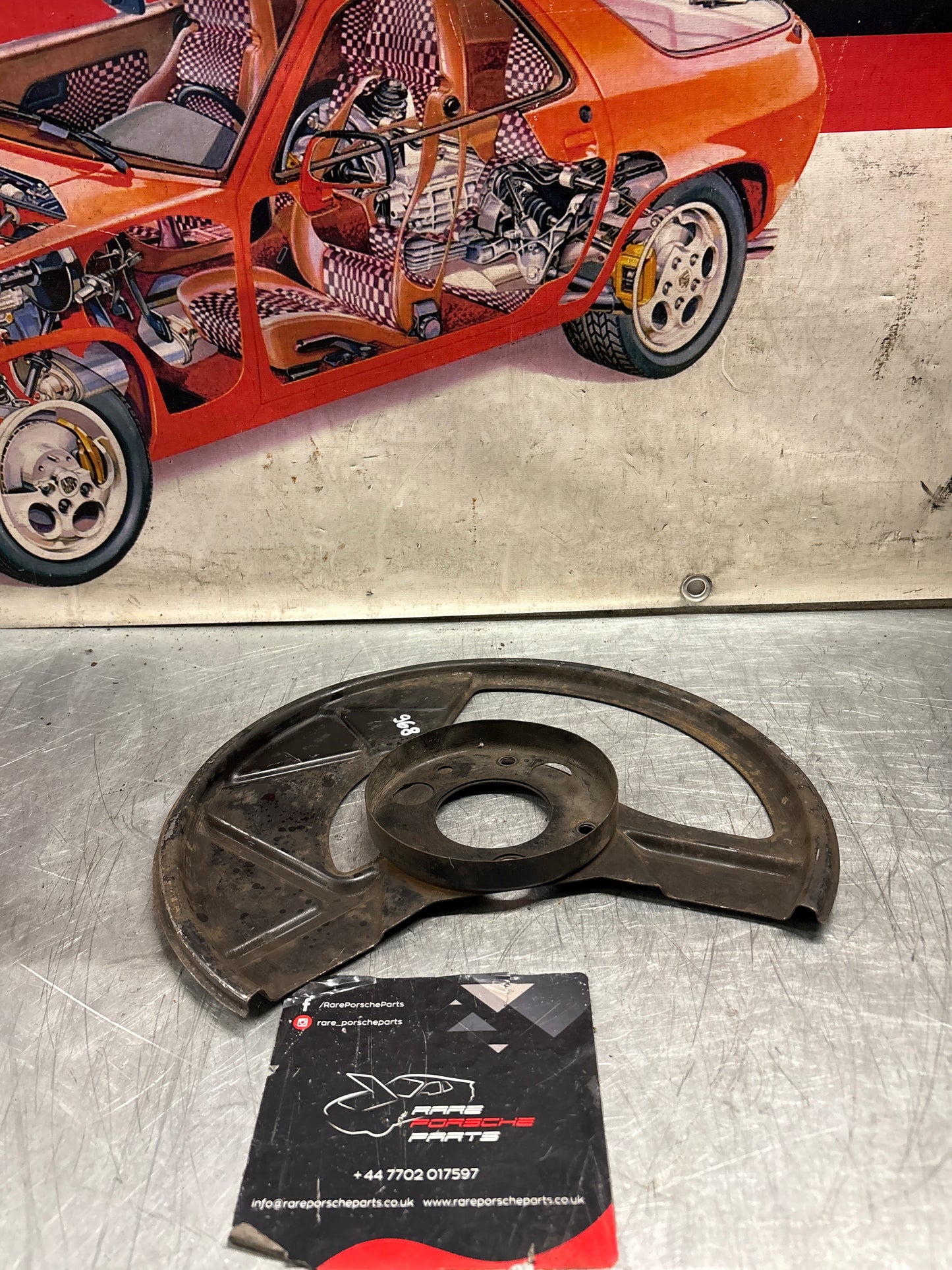 Porsche 968 front left brake dust cover plate, used 95135180502