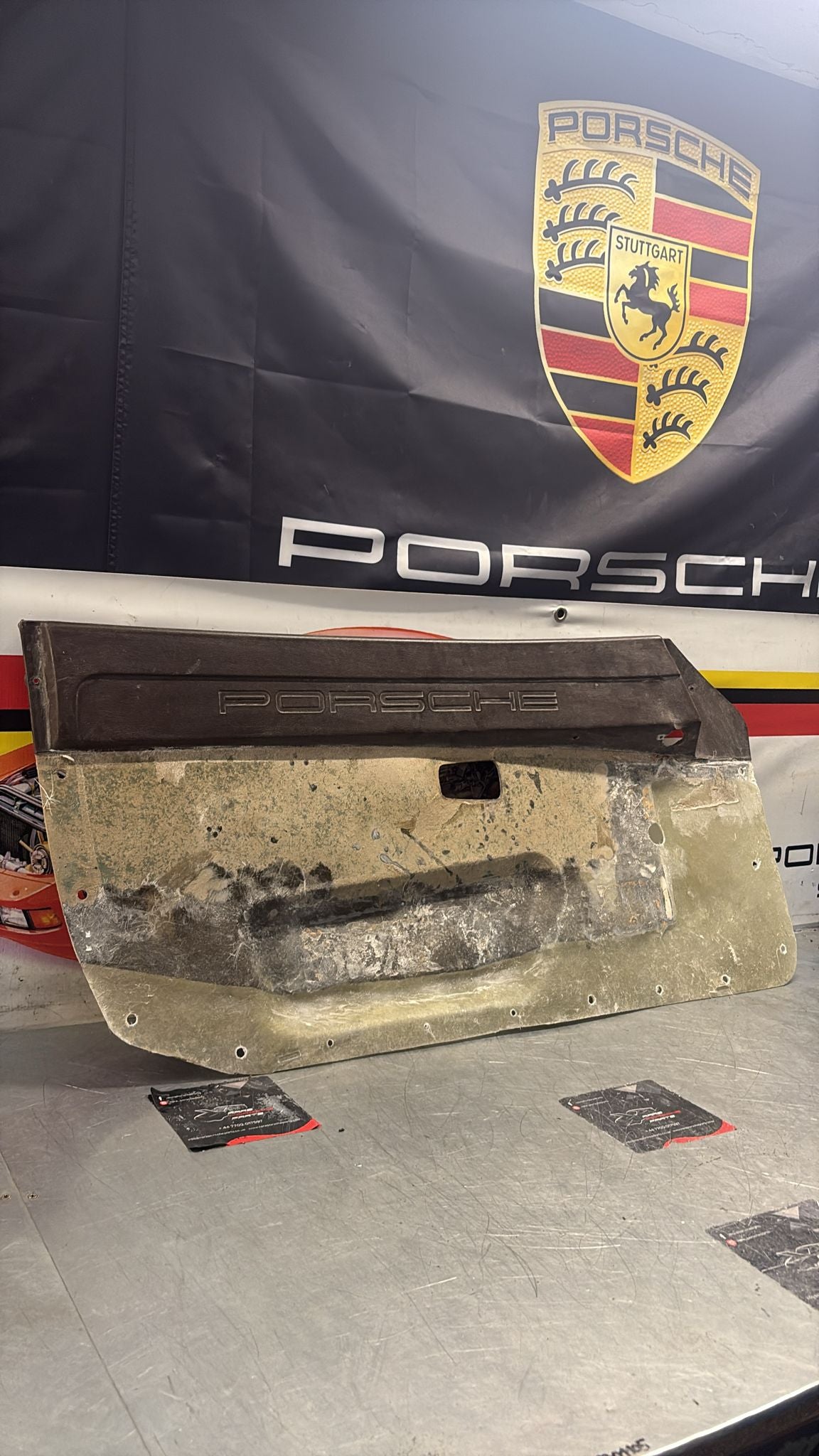 Porsche 924 / 944 early left manual Used door card, Porsche scripted brown, 477867011 no fabric!