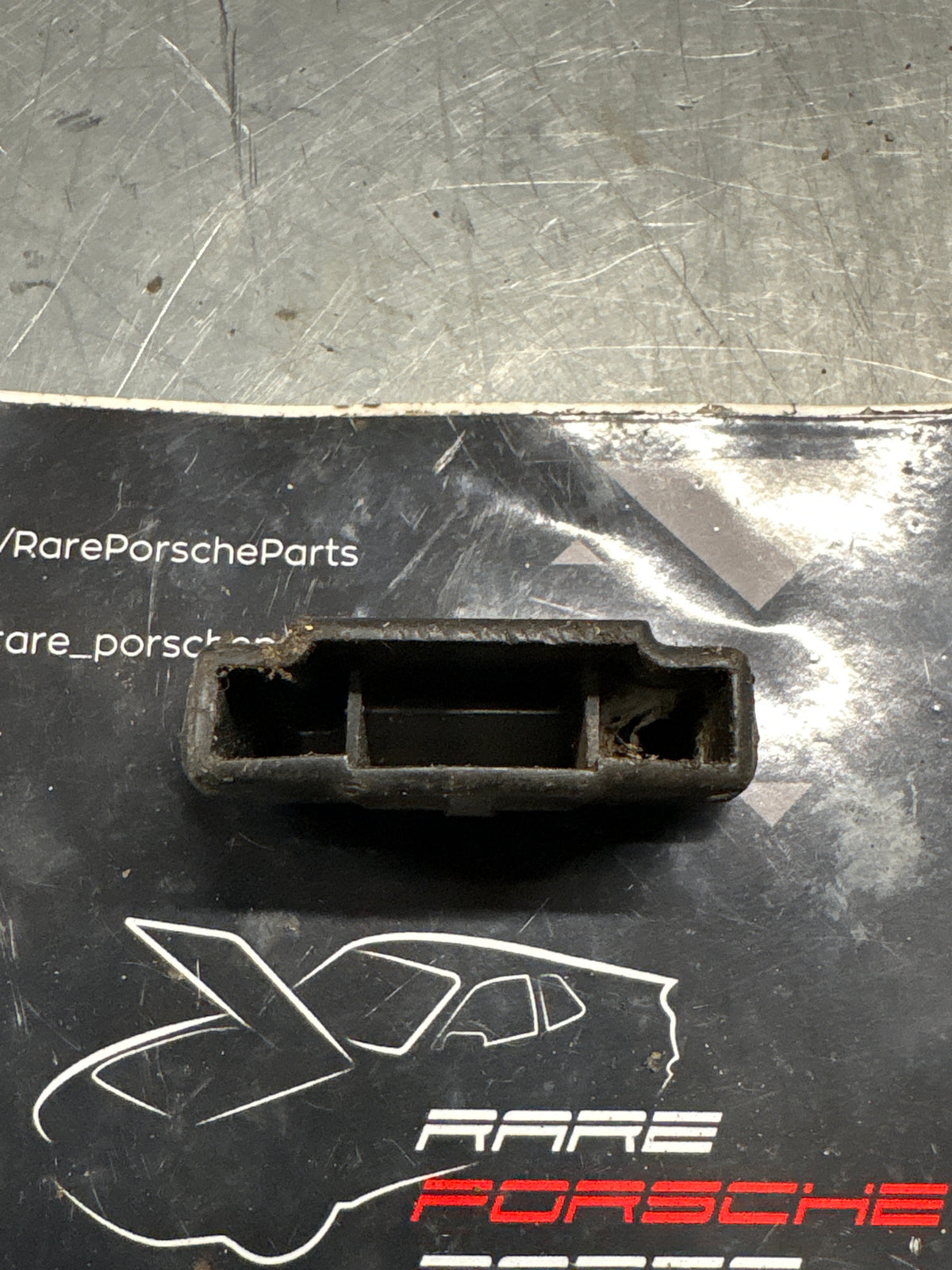 Porsche 914 seat rail end plug, used 311881349
