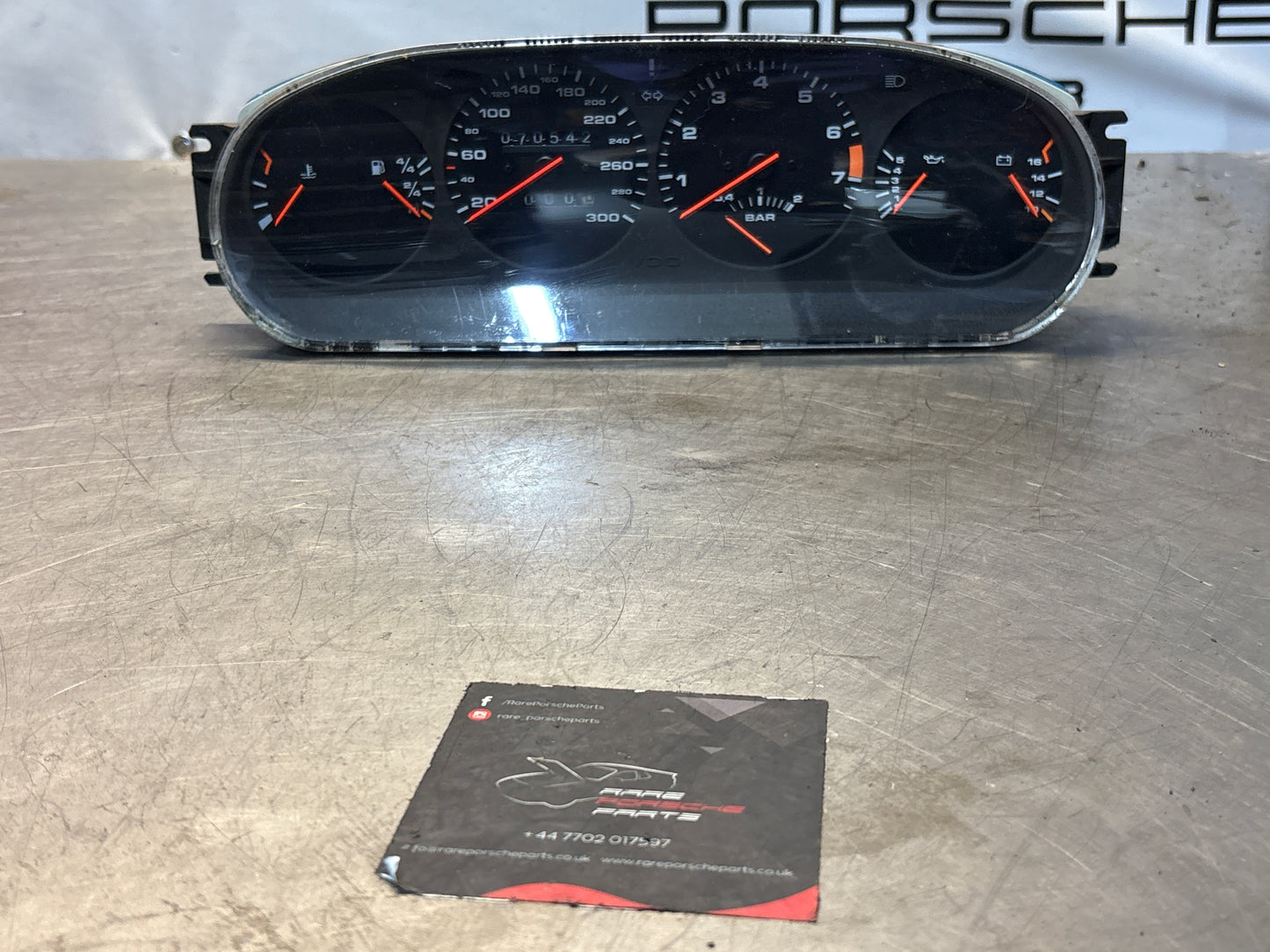 Porsche 944 Turbo dash clock binnacle pod speedometer, 951641311 used 070542 miles plastic screen has some small scratches