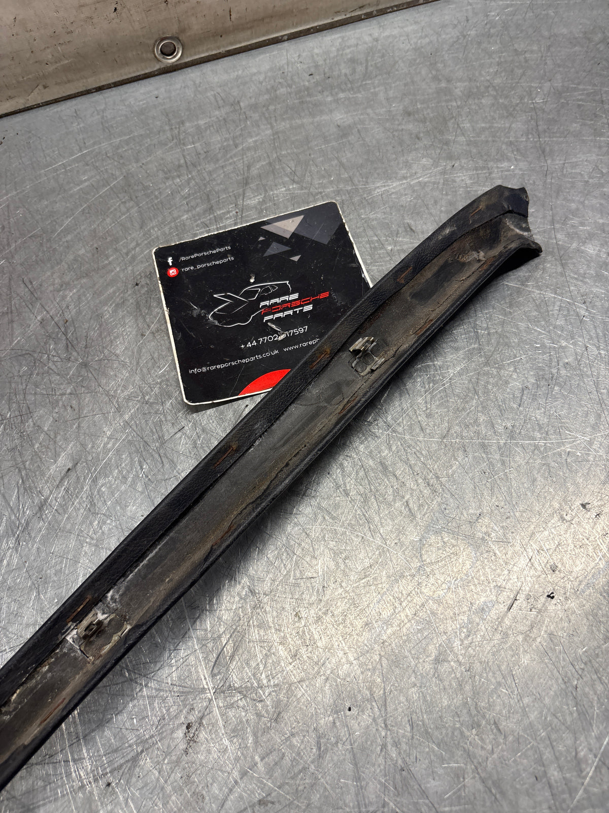 Porsche 928 right, off side door upper frame surround trim, marine blue 92855502602, used