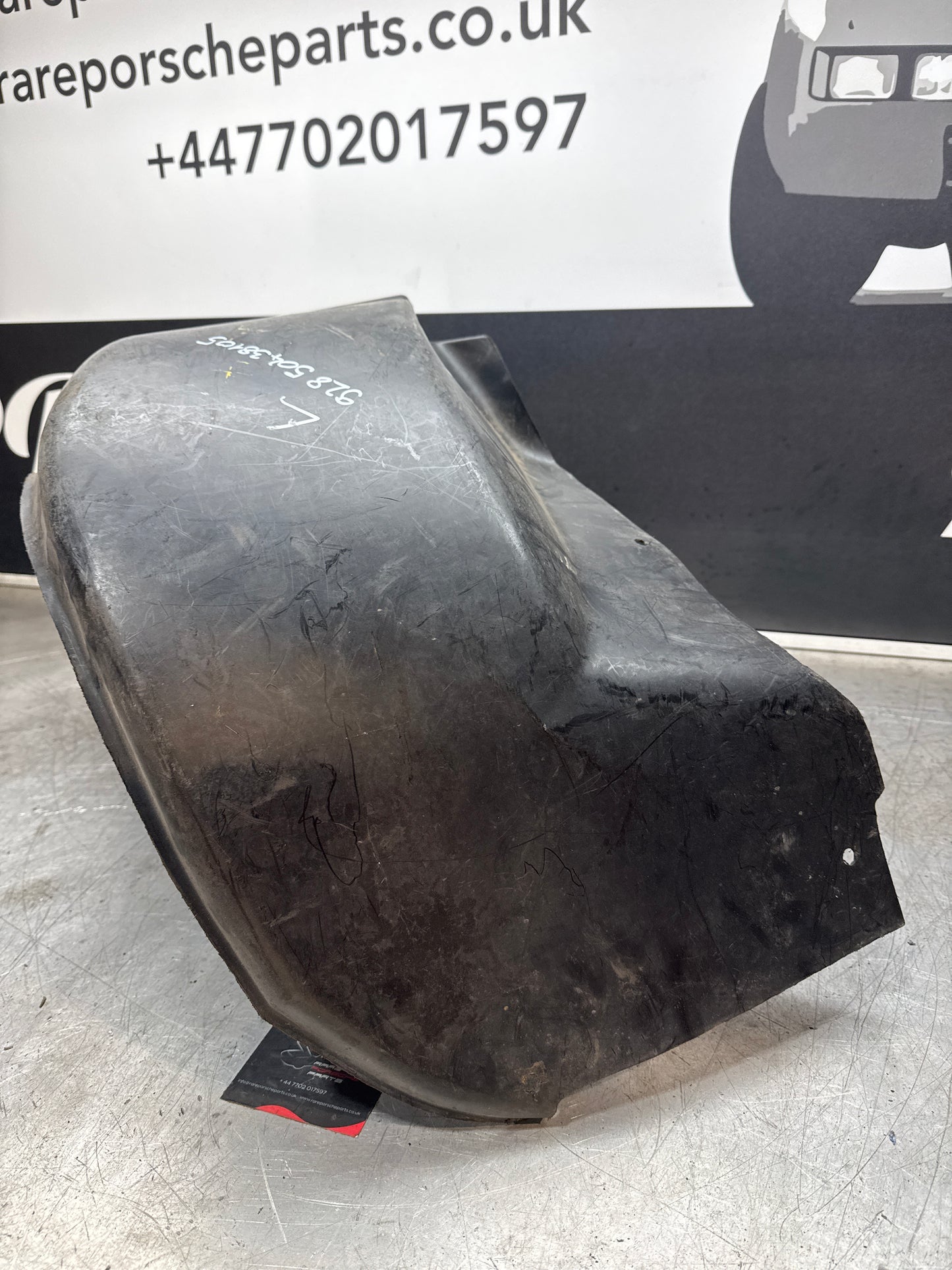 Porsche 928 wheel arch liner  Left 92850438105 Used