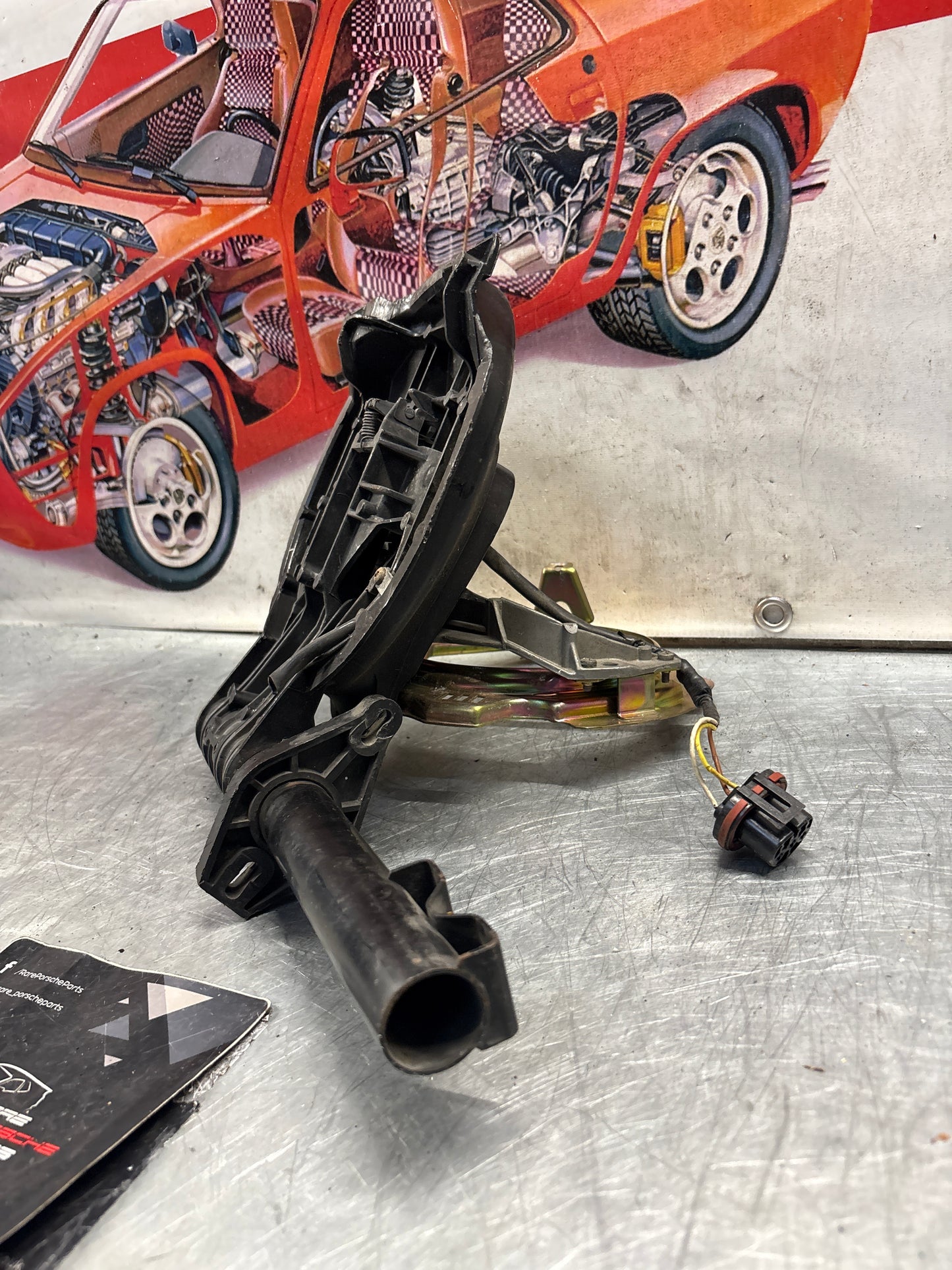 Porsche 928 right headlight swivel frame 92875024902 92875024302 used