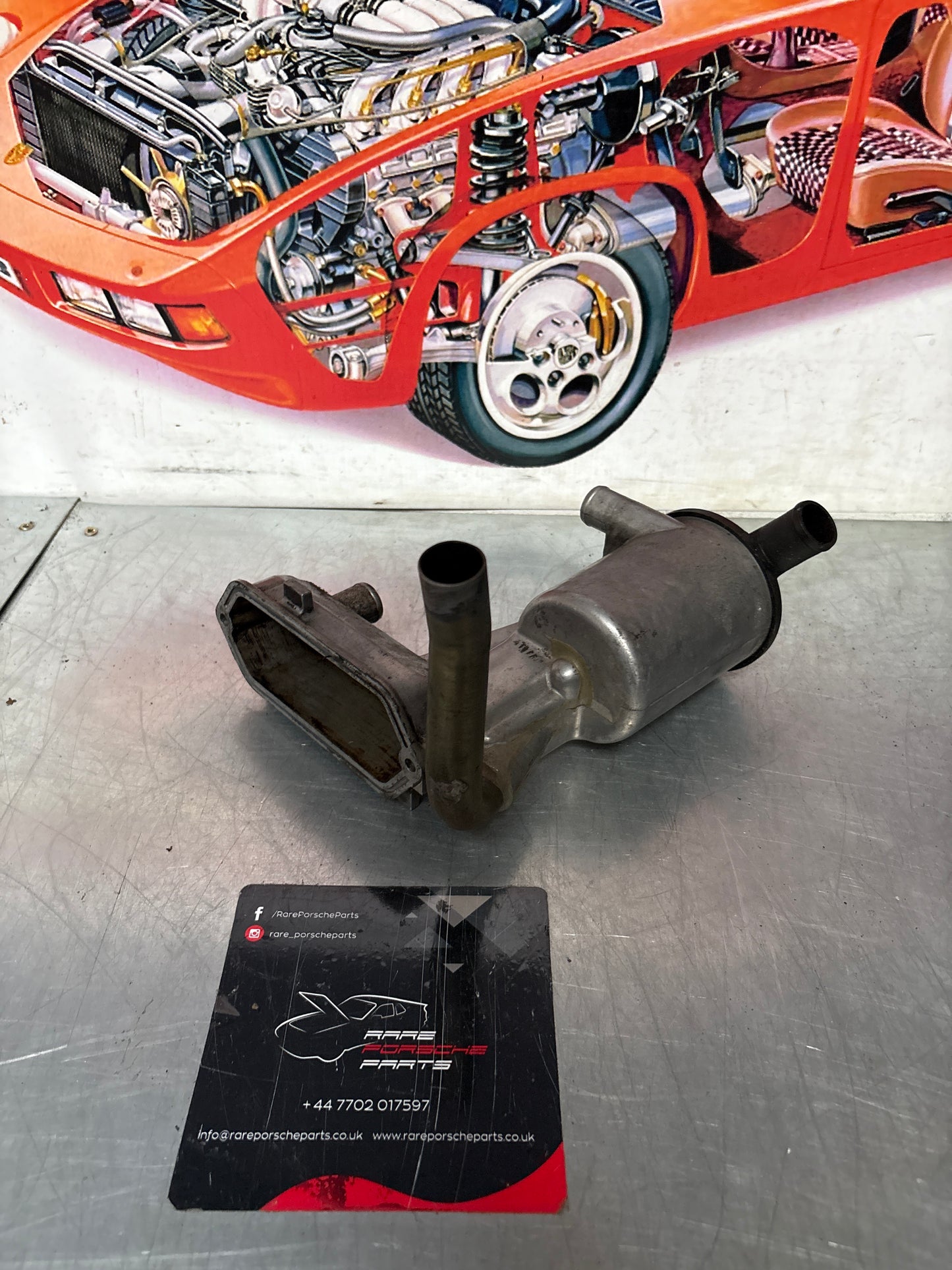Porsche 928 oil filter housing, used 9281077091R