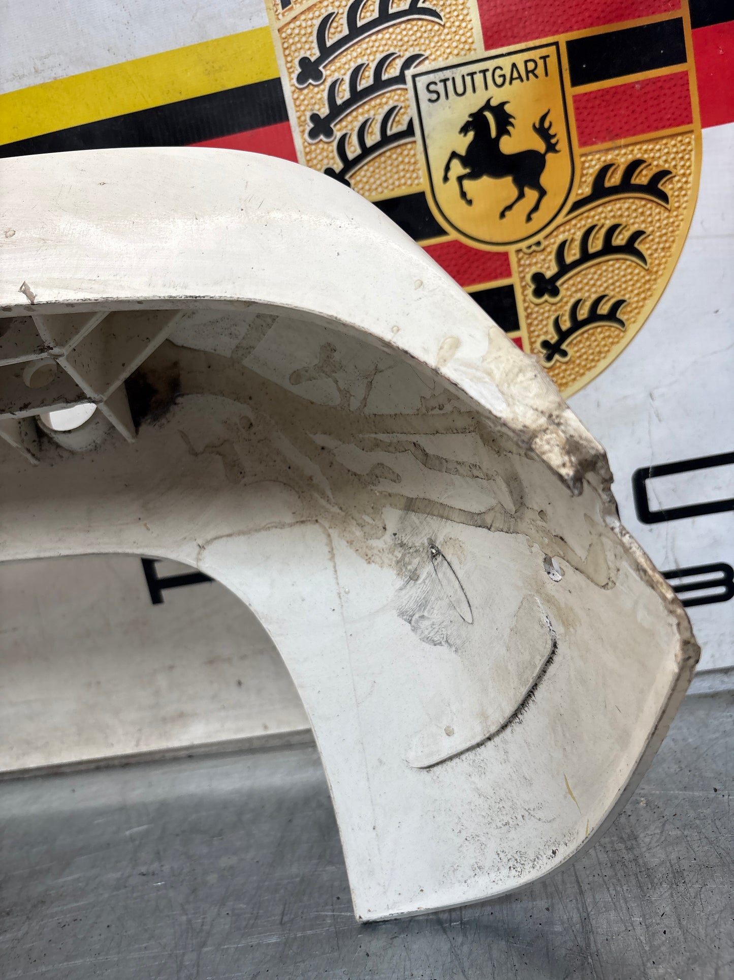 Porsche 944 rear bumper, NOS damaged 93150538700