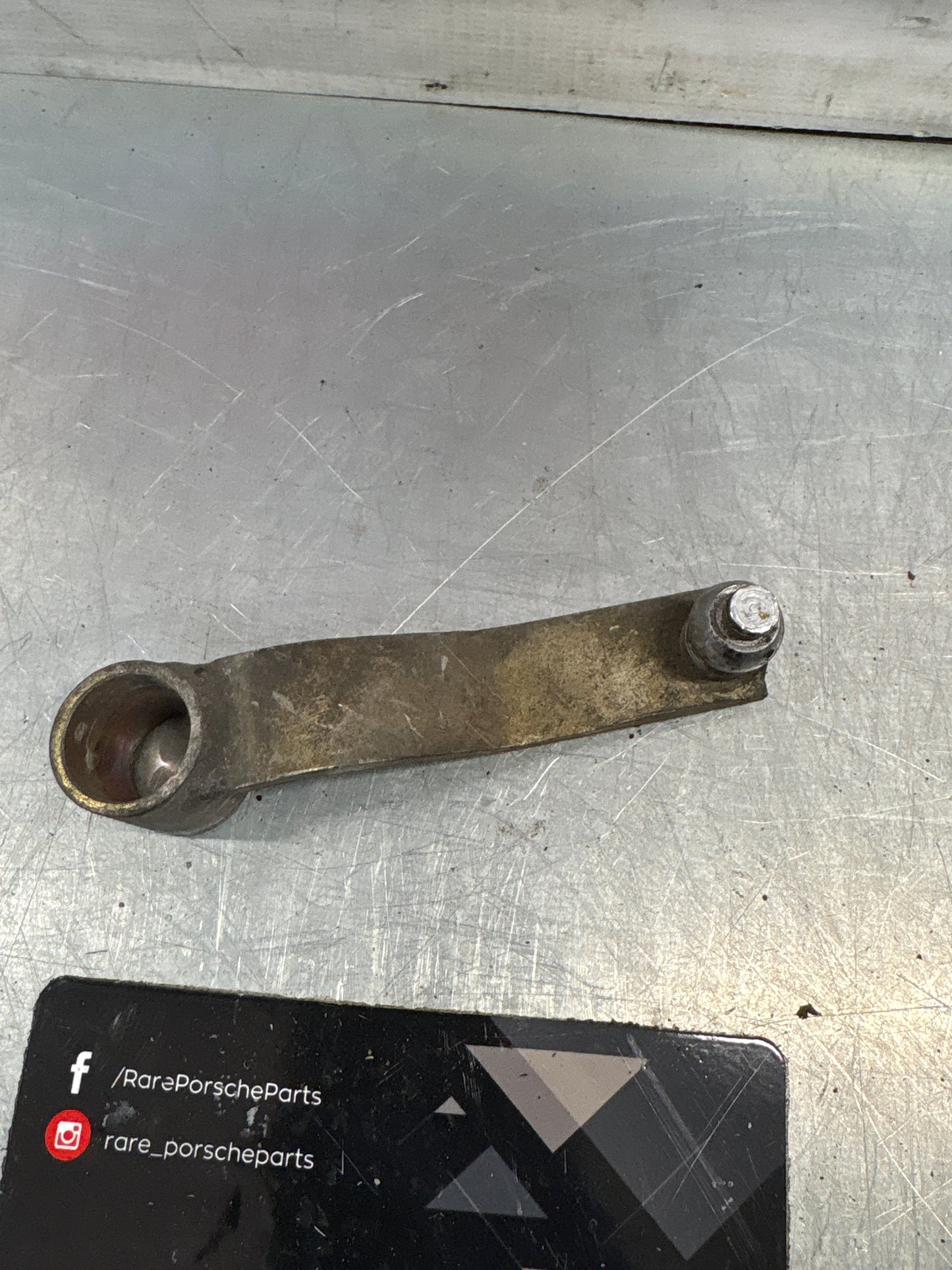 Porsche 924/944 headlight lever, used 477805651