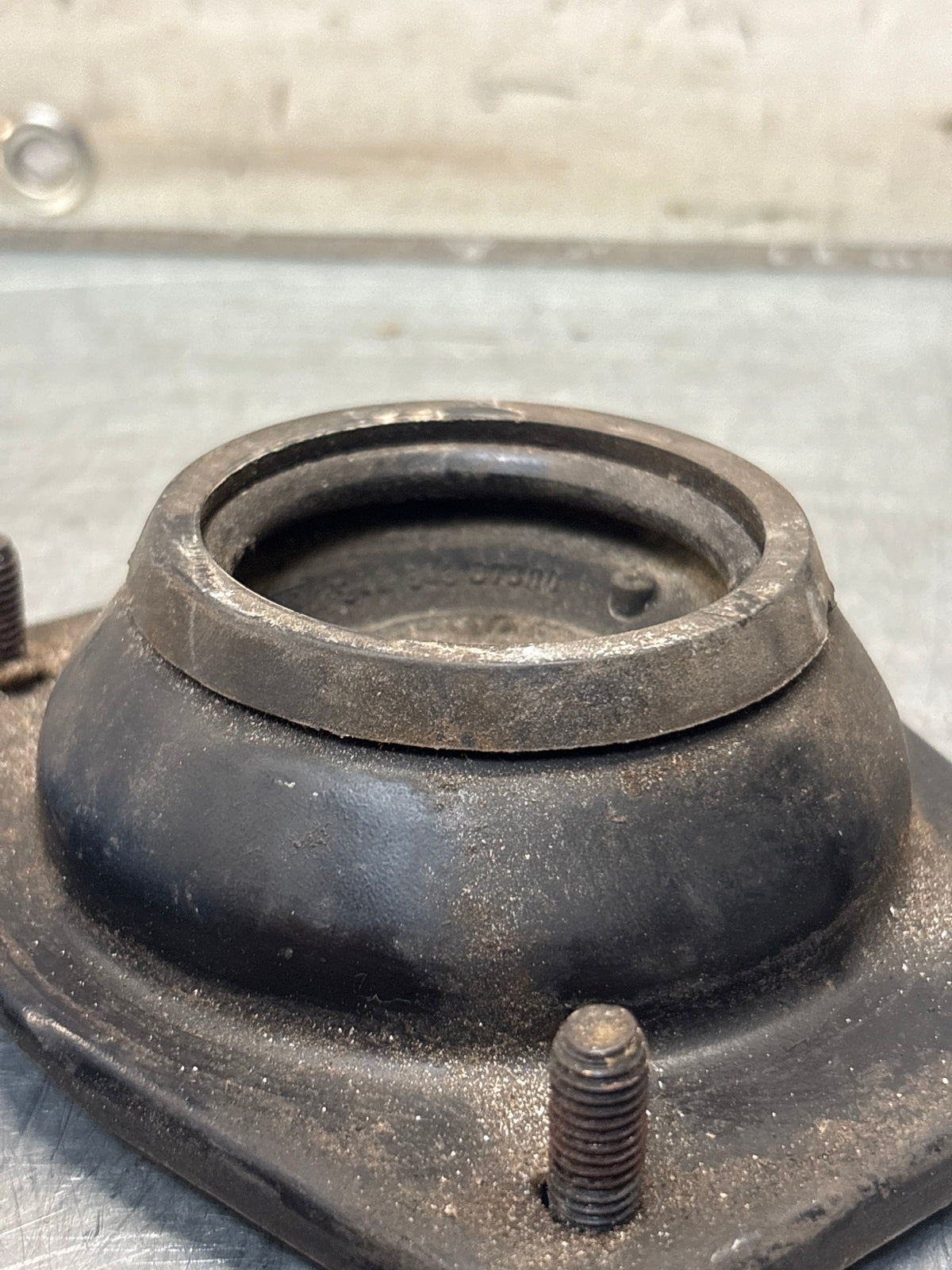 Porsche 924 / 944 front suspension bearing flange, 477412345, used