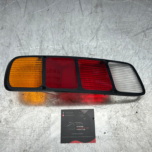 New Porsche 928 rear left light lense, used 92863140300 NOS