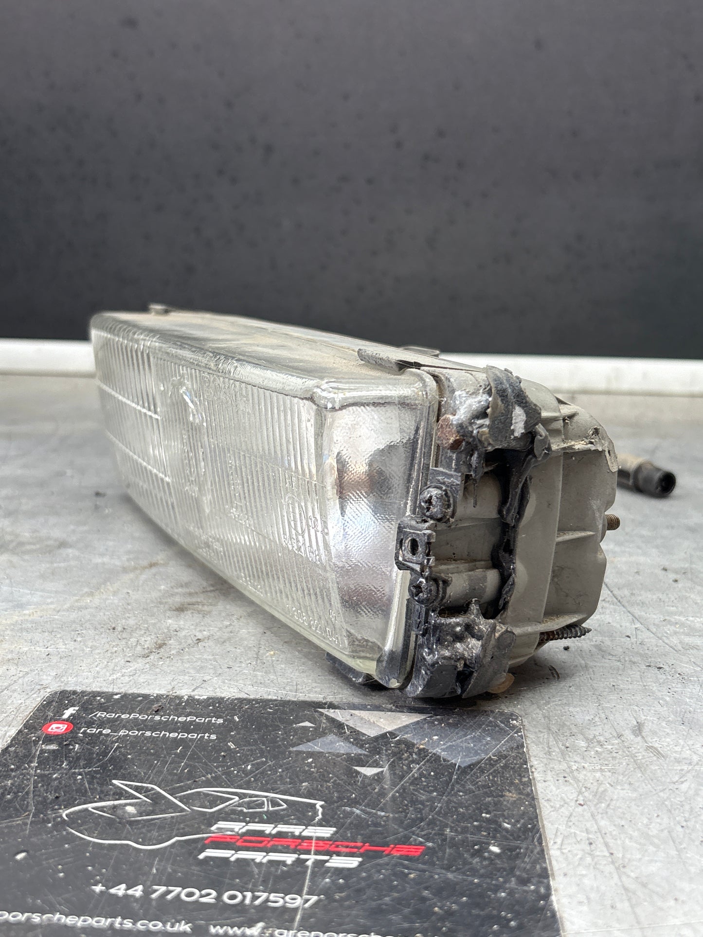 Porsche 944 S2 Turbo left foglight 95163121100 / 0305200701 cracked spares or repair