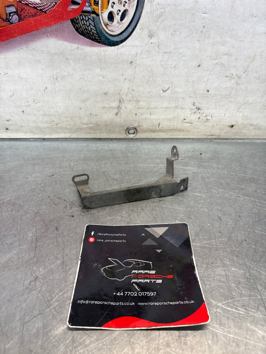 Porsche 944 steering coloumn bracket, left, used 94461814100