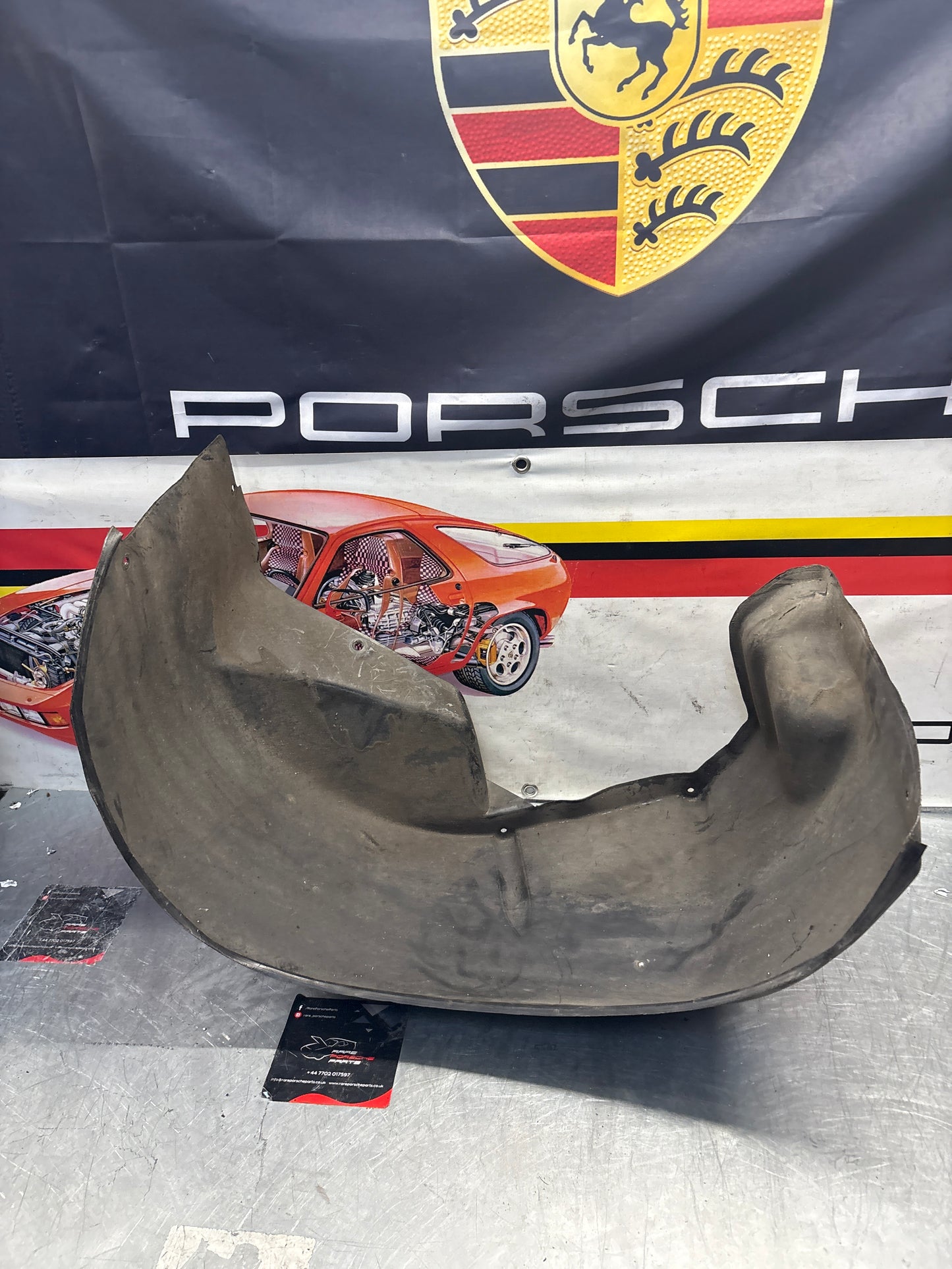 Porsche 928 wheel arch liner  Left 92850438105 Used
