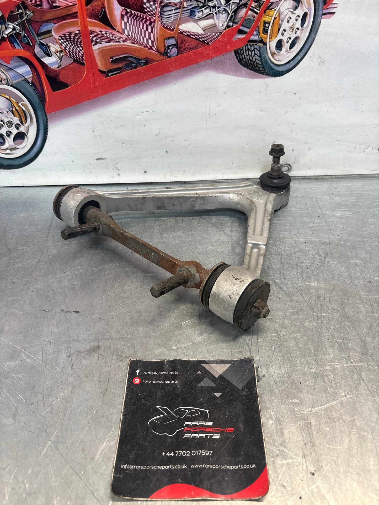 Porsche 928 front upper left control arm, used 92834145722