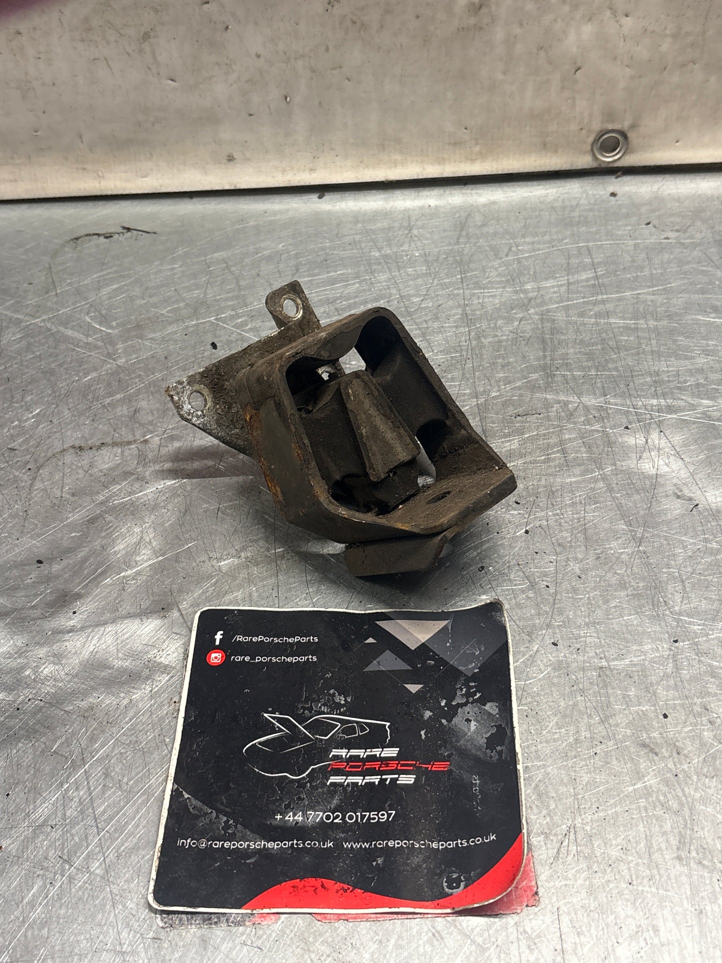 Porsche 924/944 gearbox mount, 477399153J / 94437504500, used