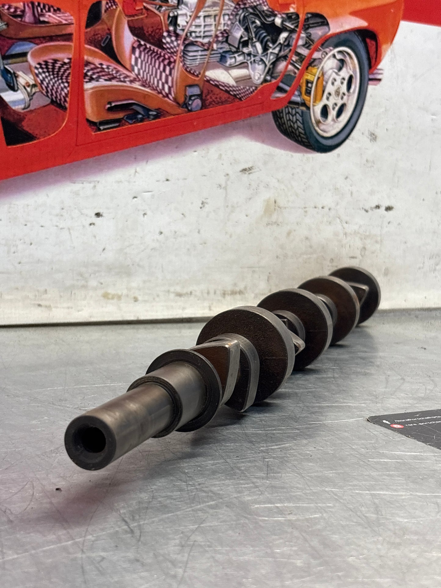 Porsche 928 cam shaft, used 9281052040R