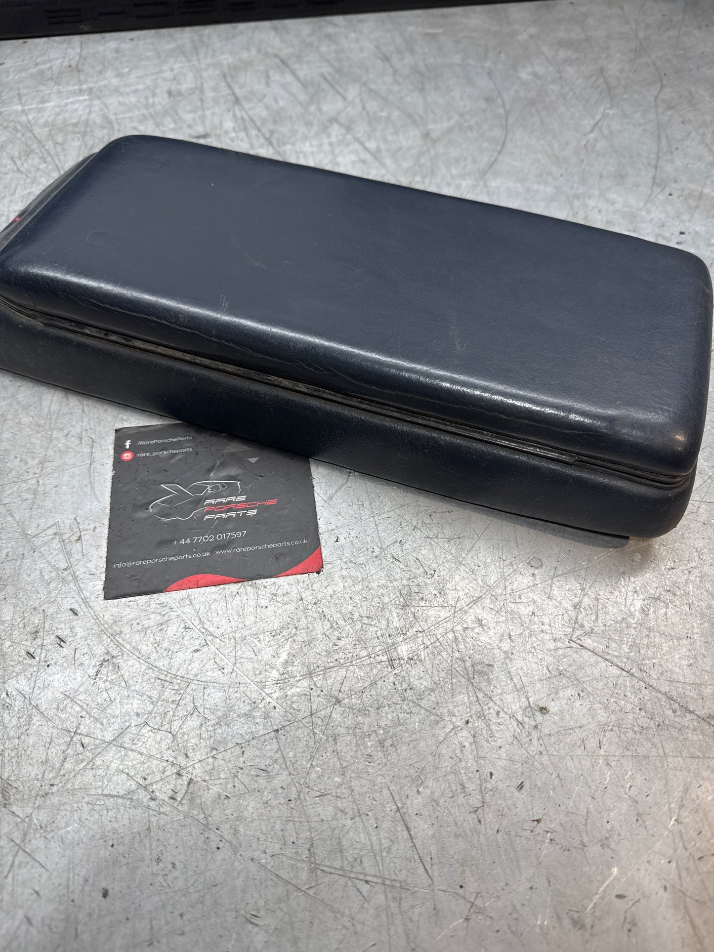 Porsche 928 92755572903 Central armrest cassette compartment black, used RHD
