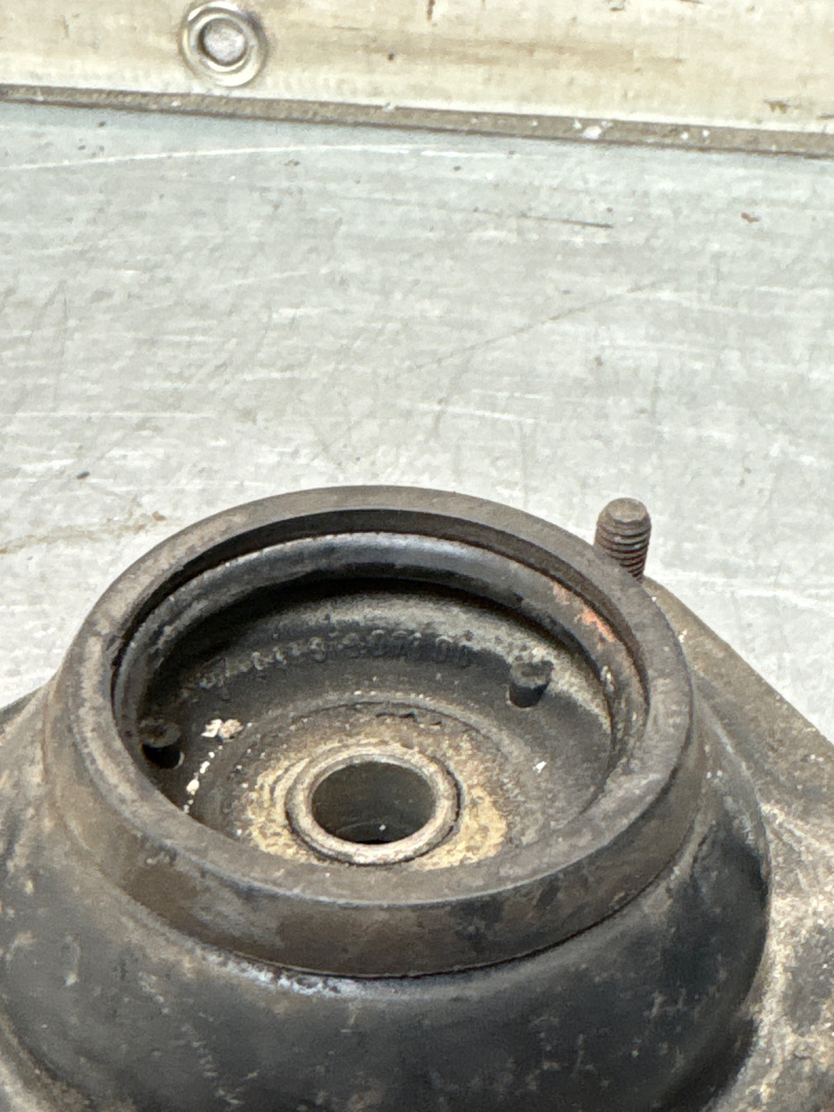 Porsche 924 / 944 front suspension bearing flange, 477412345, used