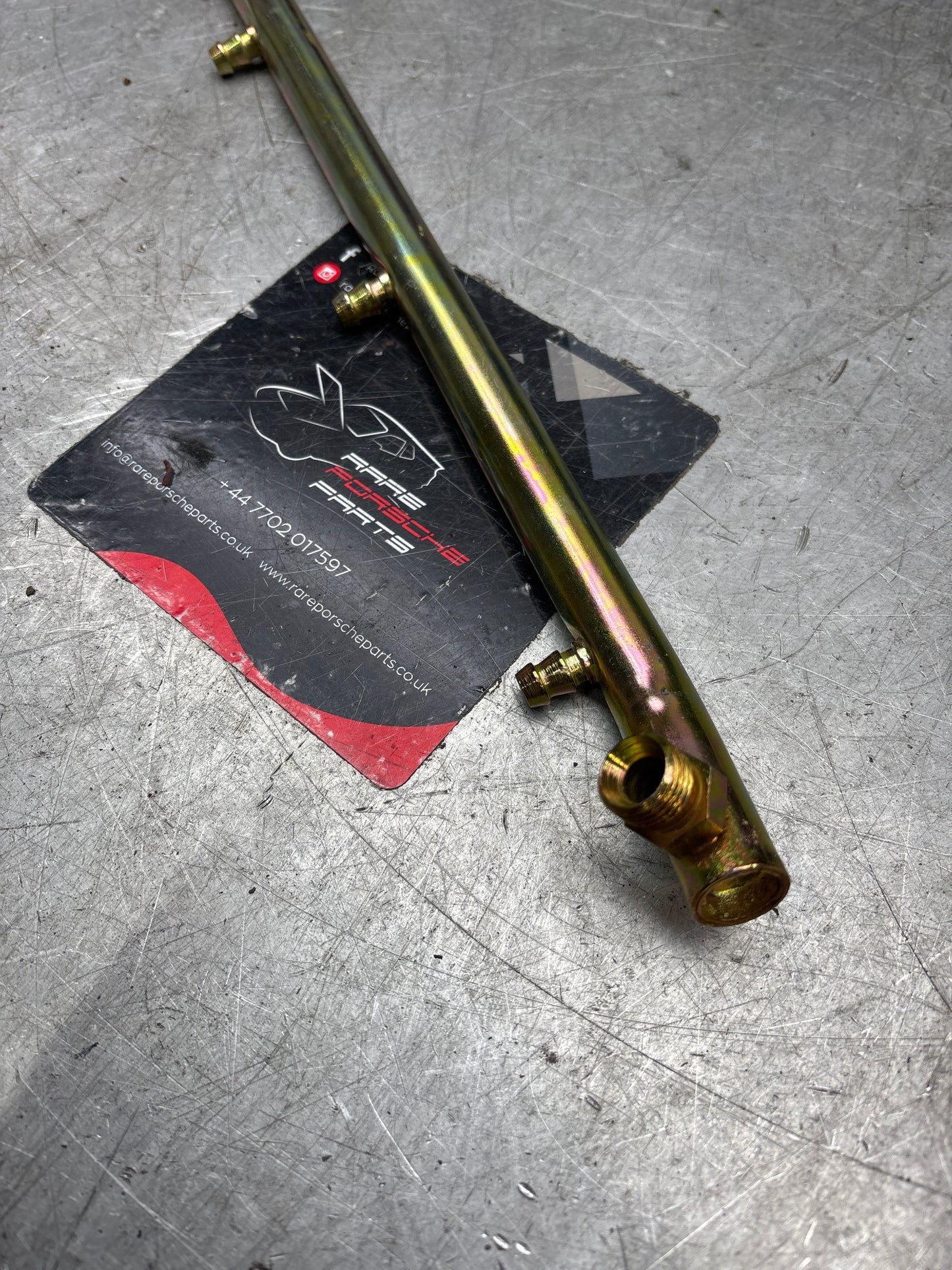 Porsche 928 fuel tube left, refurbished 92811007906