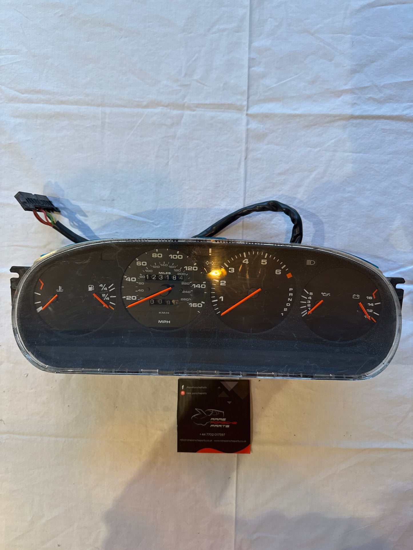 Porsche 944 dash clock binnacle pod speedometer, 94564131107 used 123184 miles plastic screen has some small scratches automatic