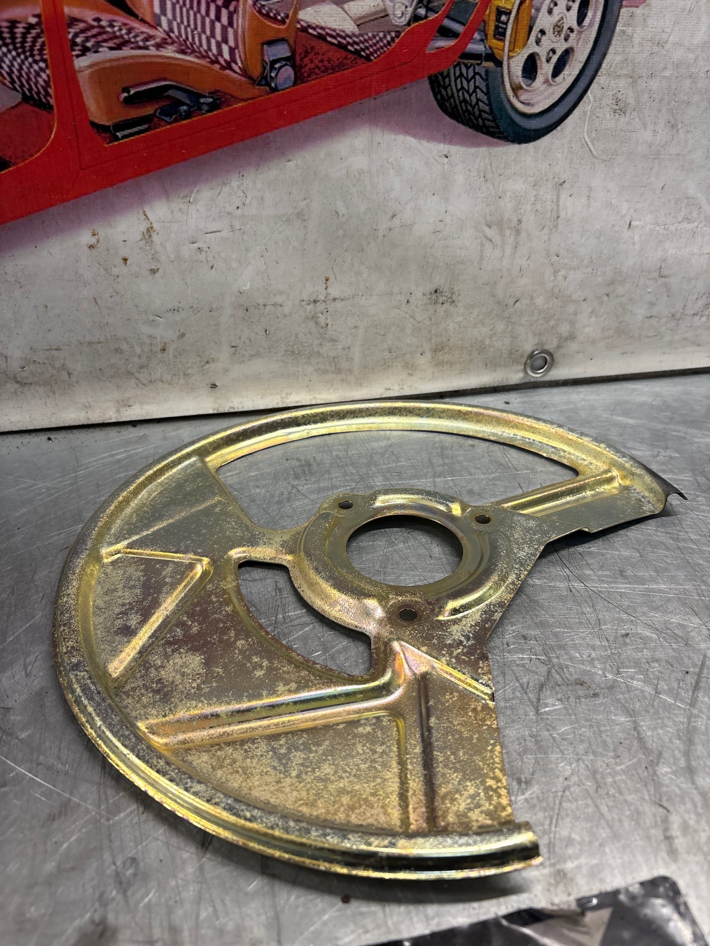 Porsche 968 front left brake dust cover plate, used 95135180502