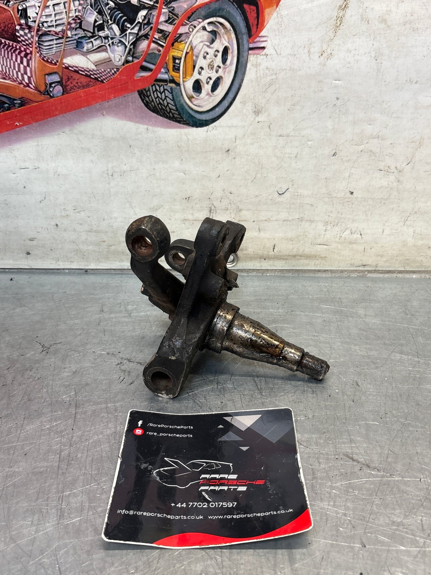 Porsche 928 right steering spindle knuckle, used 92834105813