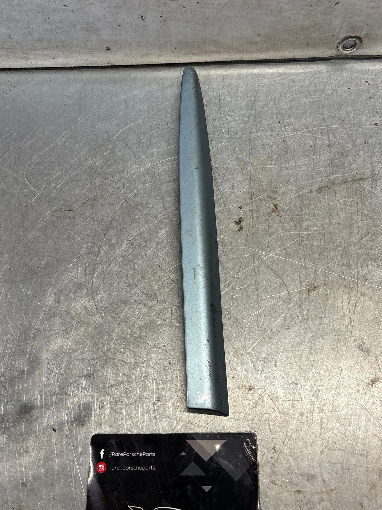 Porsche 928 left side front wing molding trim, used 92855903703