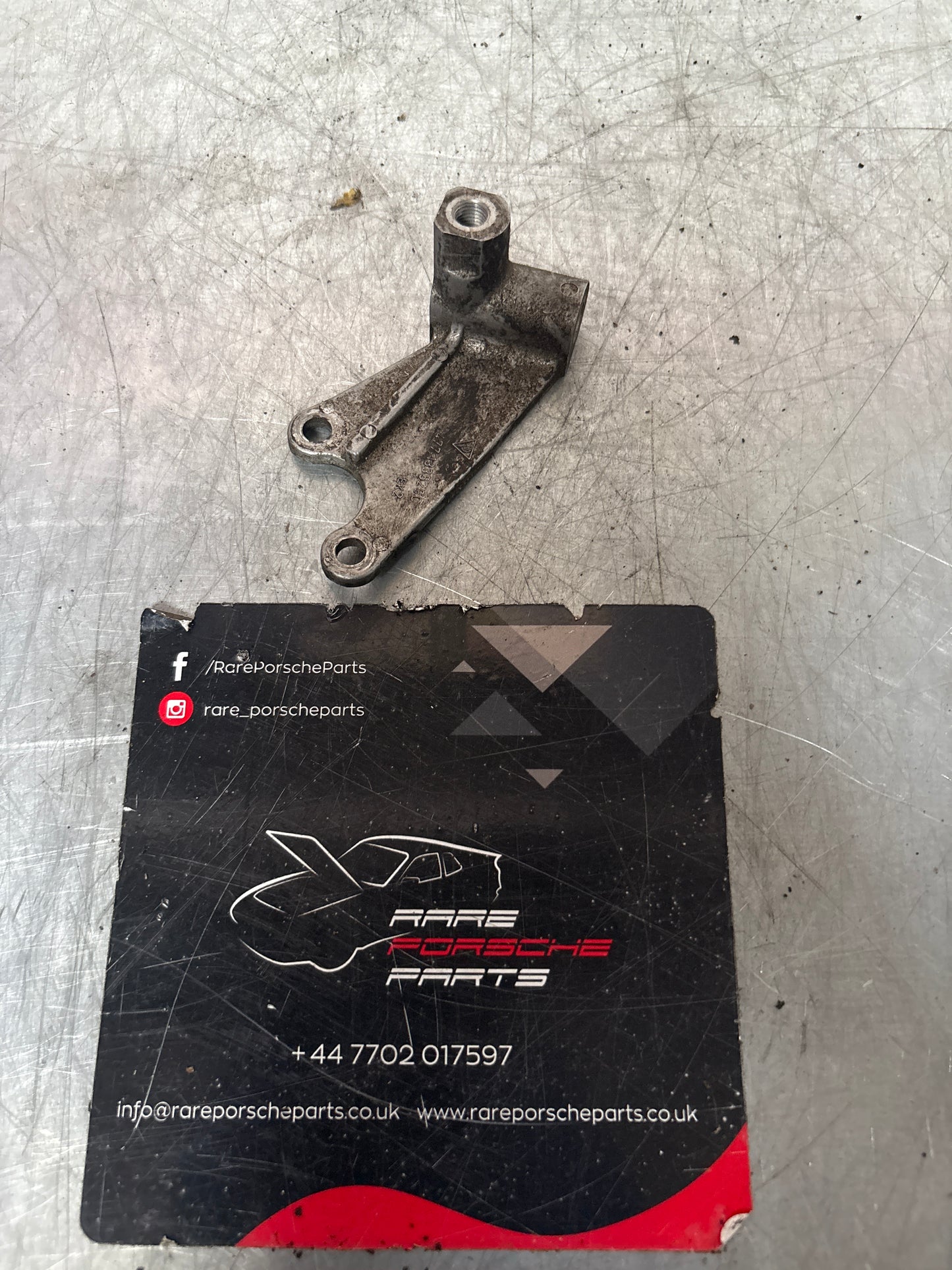 Porsche 924 Solenoid valve support bracket (used) 477133529C