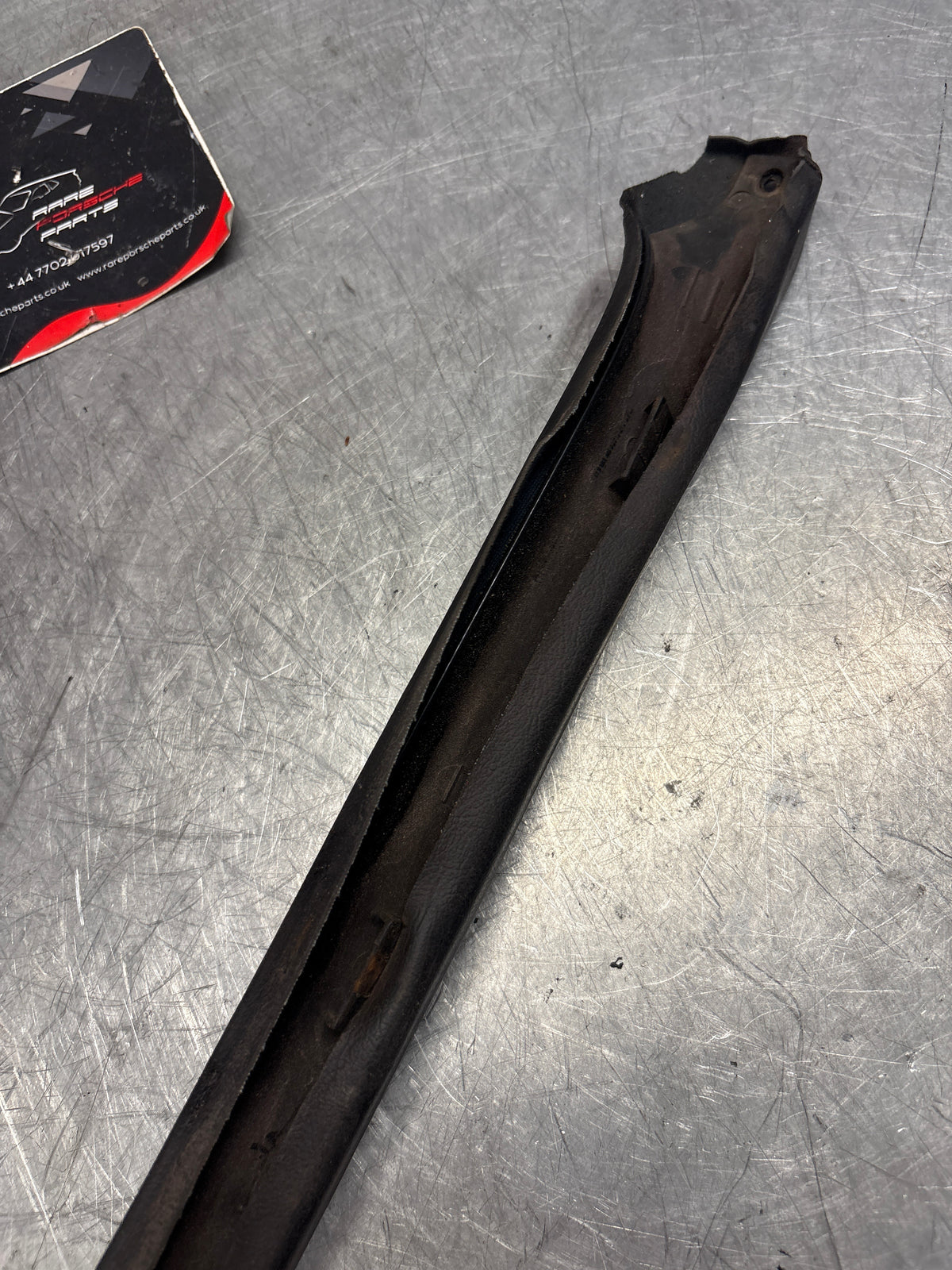 Porsche 928 tailgate trim, left, near side, black, 92855503702, used