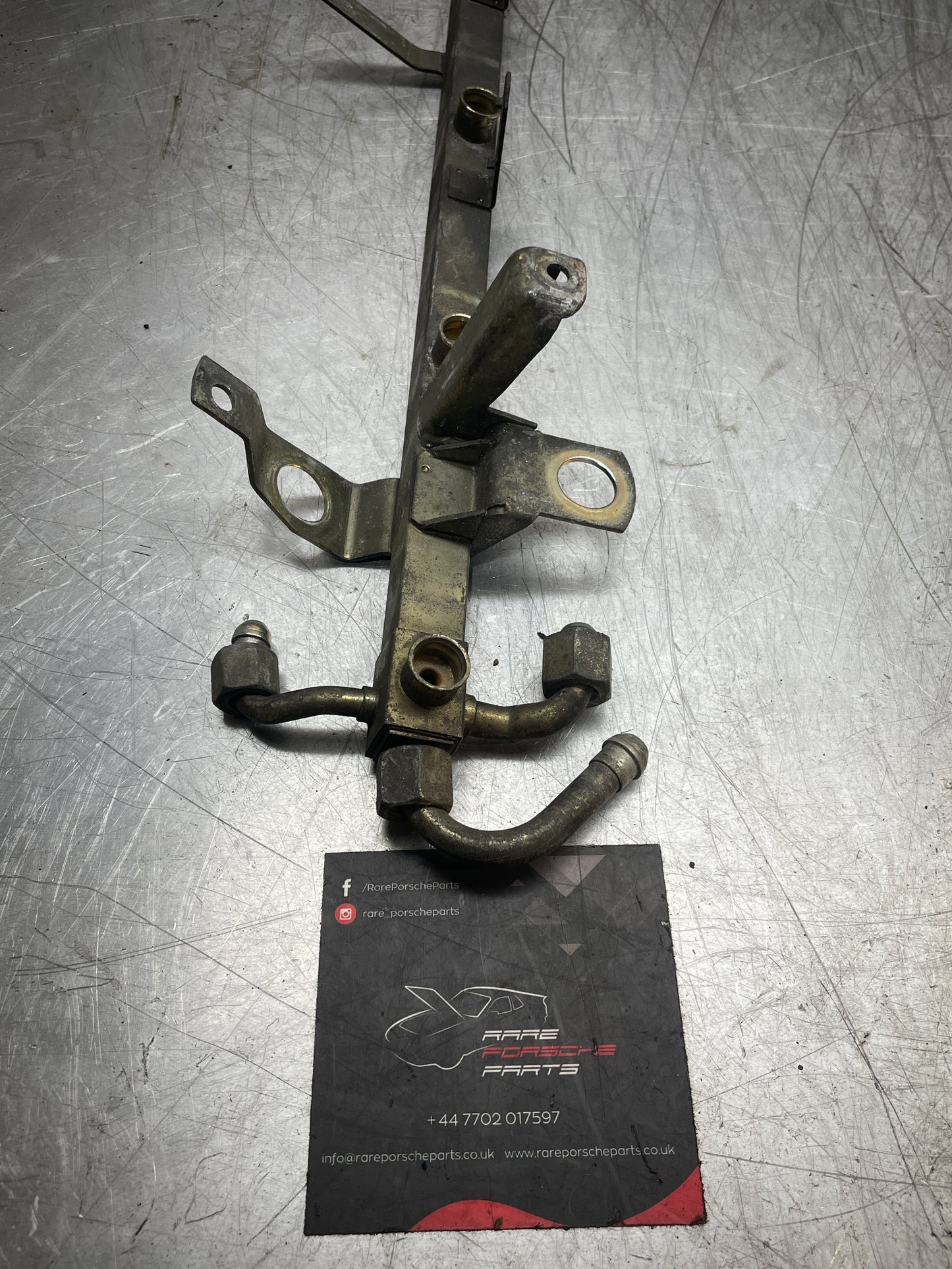 Porsche 944 2.5 N/A 82-85 fuel rail, used 94411008004