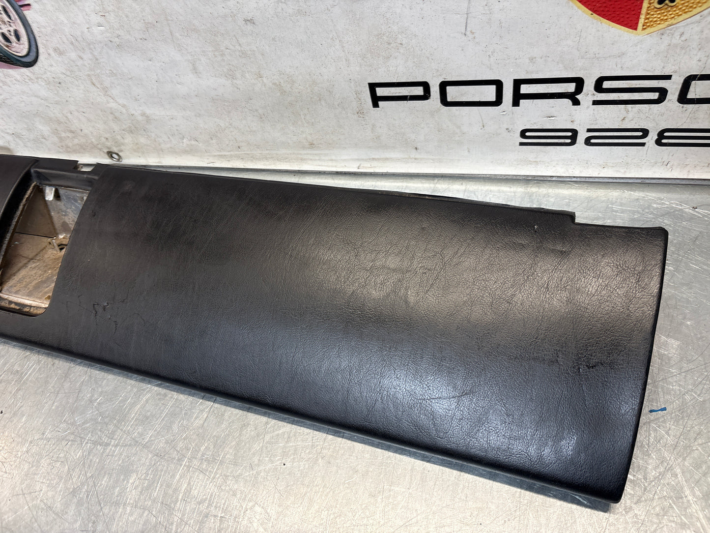 Porsche 911 964 dashboard lower knee protection trim, black leather, used 96455207304 / 96455207300